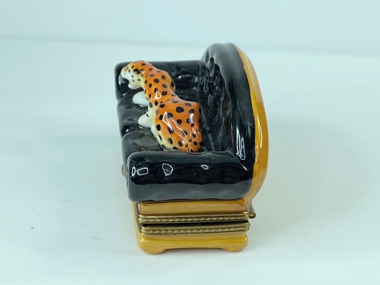 Limoges hand painted Leopard on Couch 3 1/4" x 1 1/2" x 1 3/4" A284