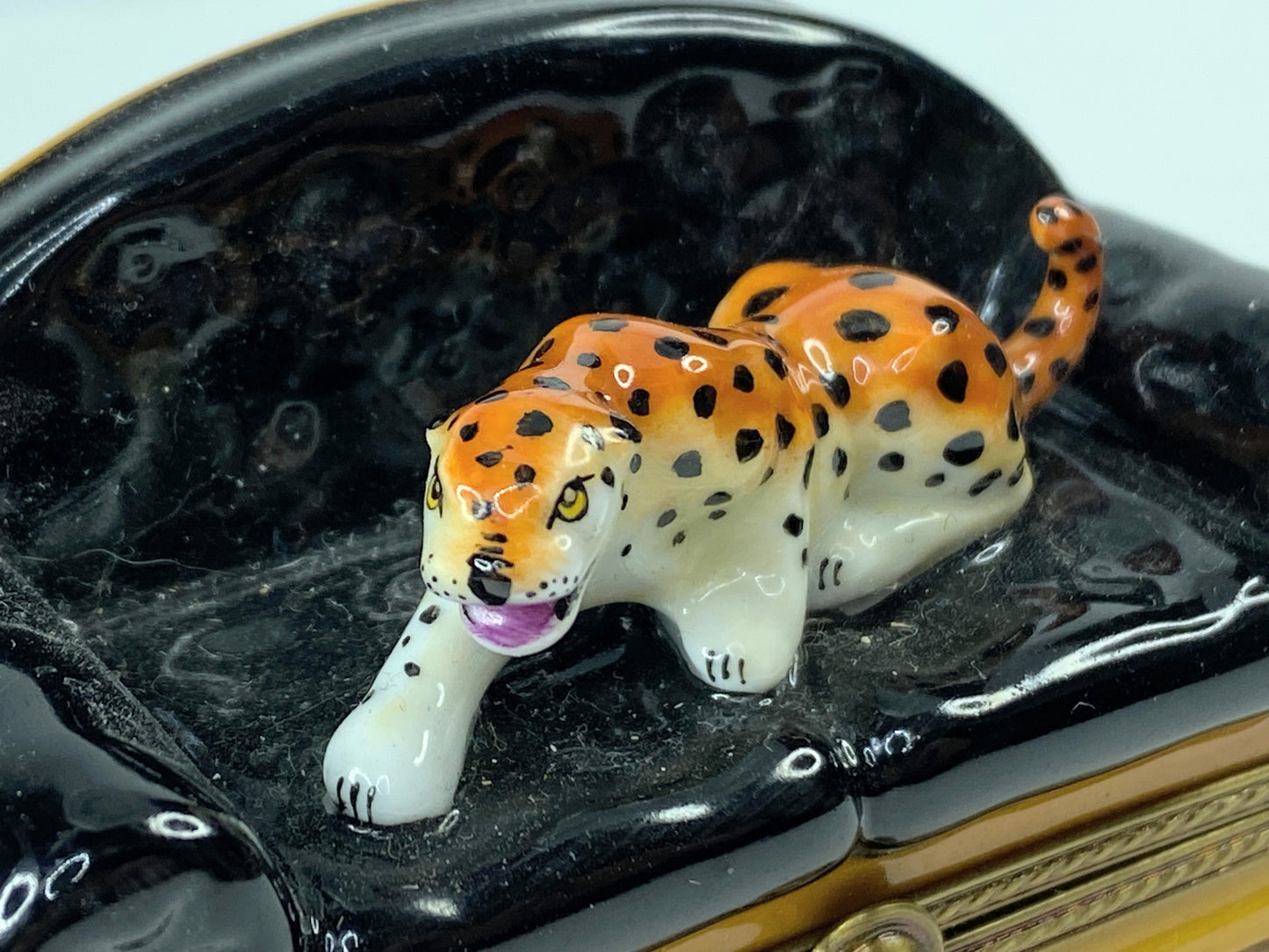 Limoges hand painted Leopard on Couch 3 1/4" x 1 1/2" x 1 3/4" A284
