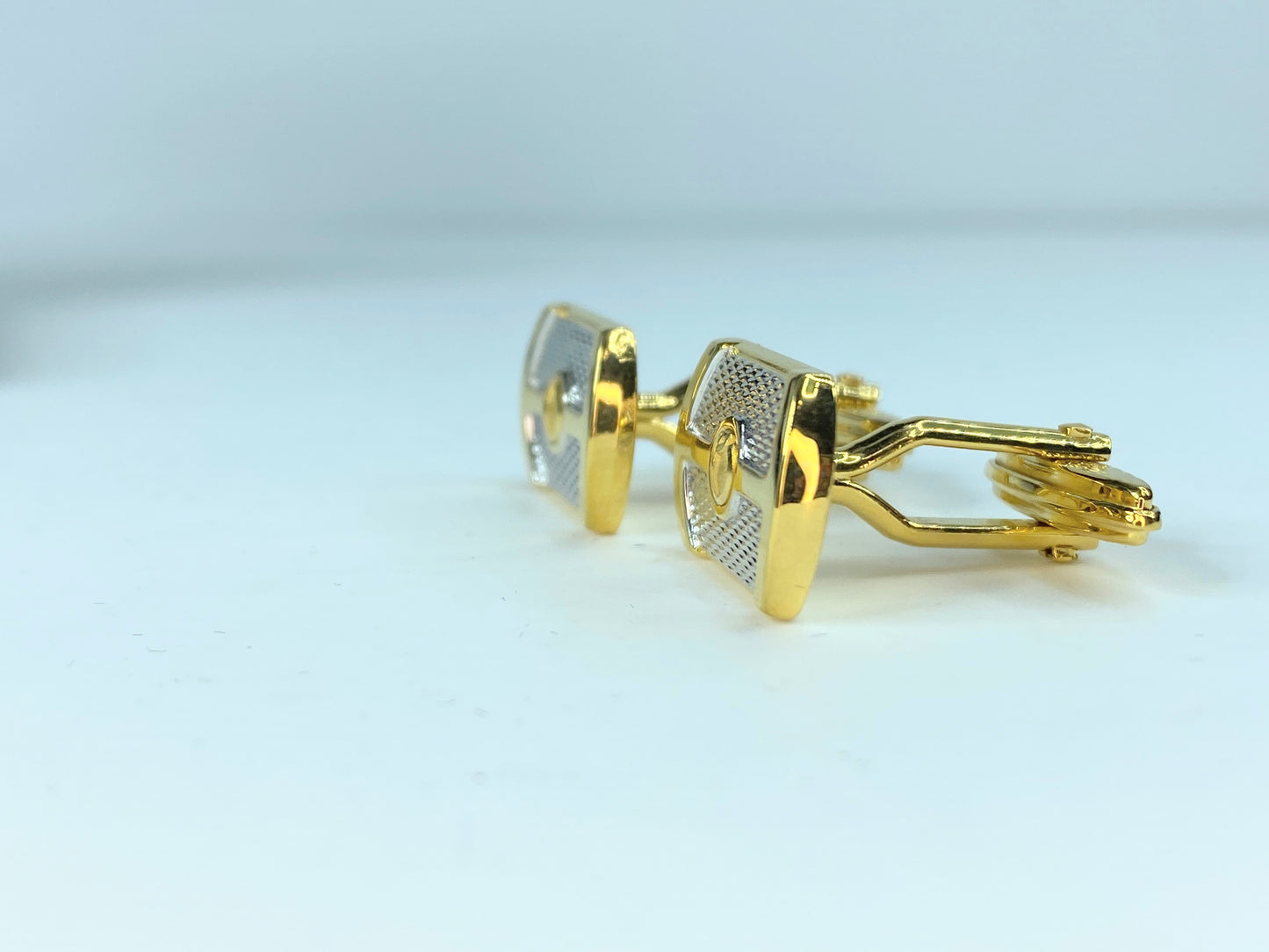 Authentic Alfred Dunhill D logo silver and gold tone texture cuff link GX110