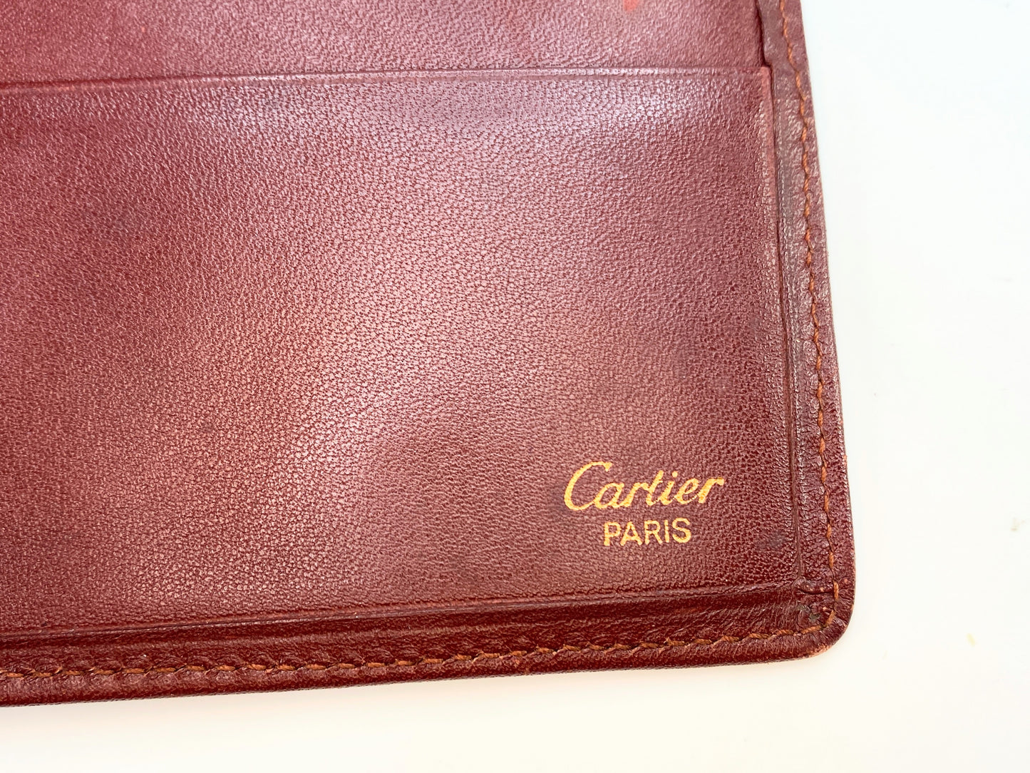 Cartier Red Breast Pocket Wallet with gold-tone hardware, trim leather 7.5" A239