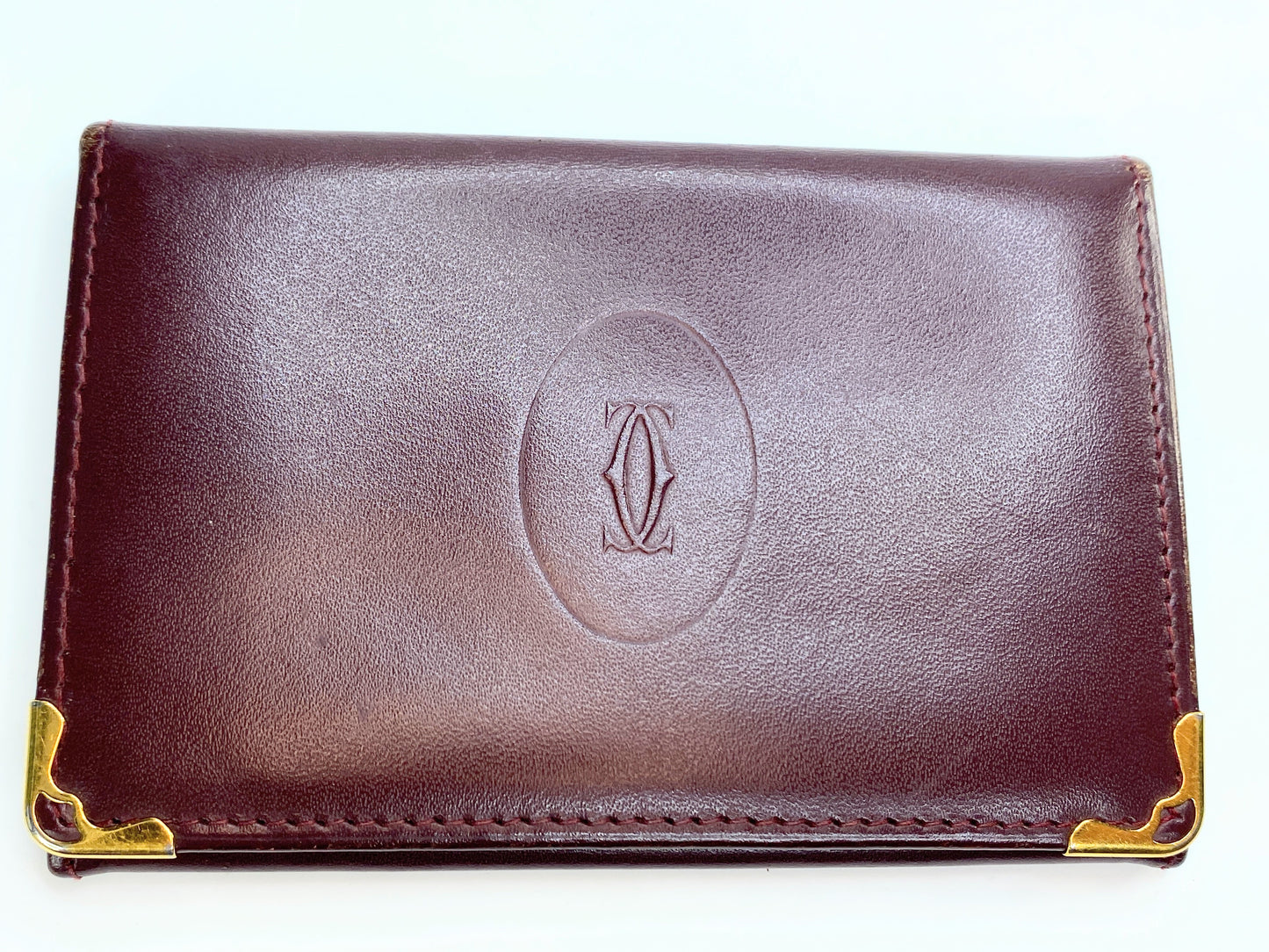 Cartier Must De wallet Red Burgundy bi-folded Leather gold-tone hardware A241