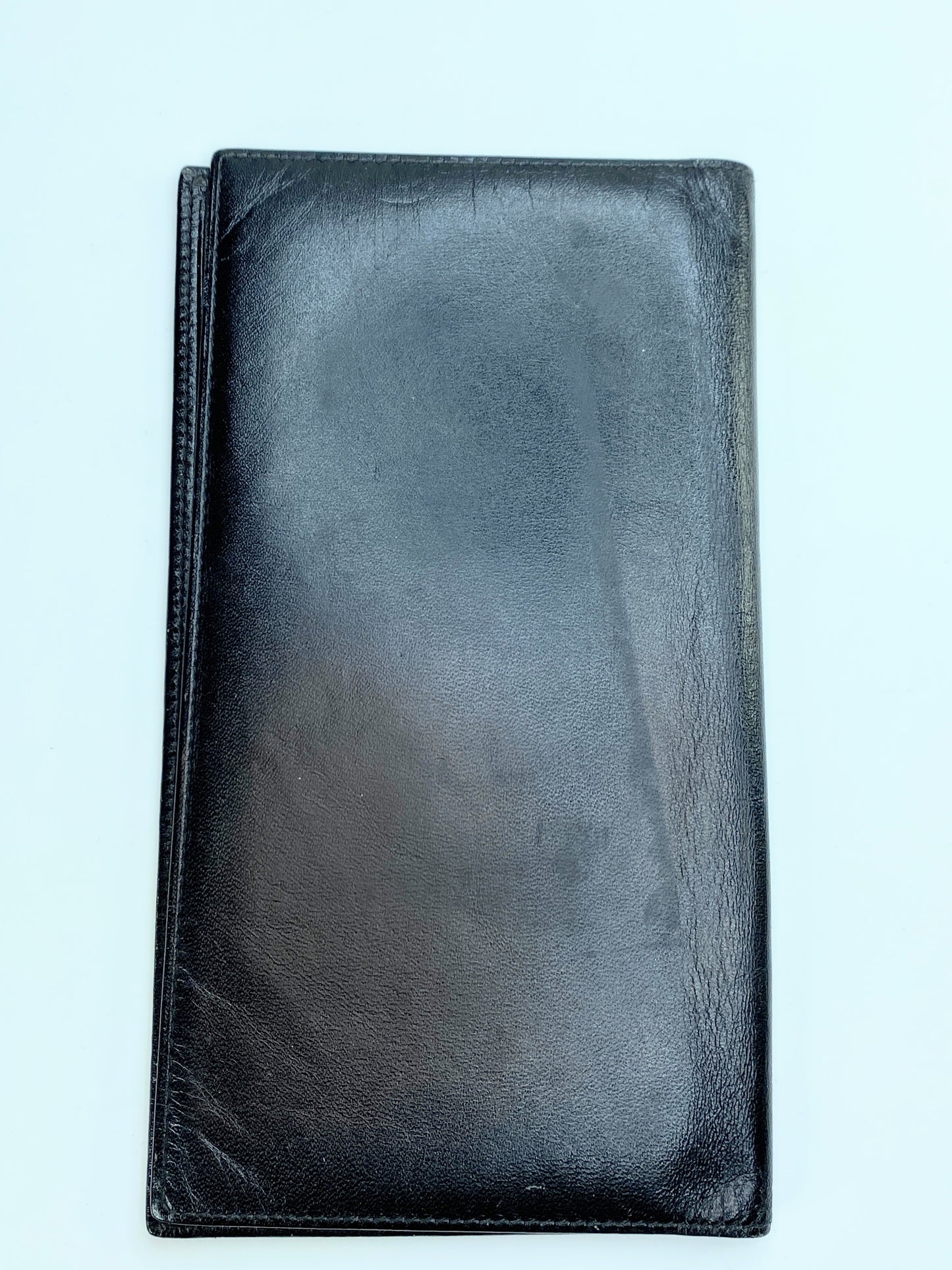 Vintage Must de Cartier, black leather check cover wallet 6 3/4" GS204