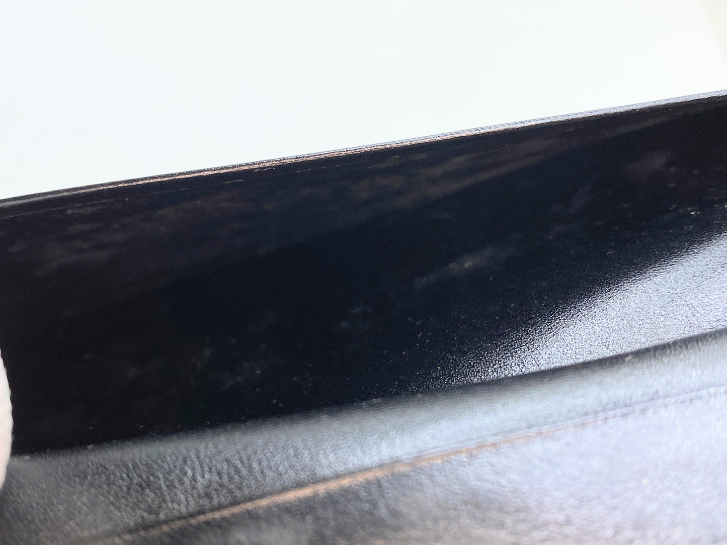Vintage Must de Cartier, black leather check cover wallet 6 3/4" GS204