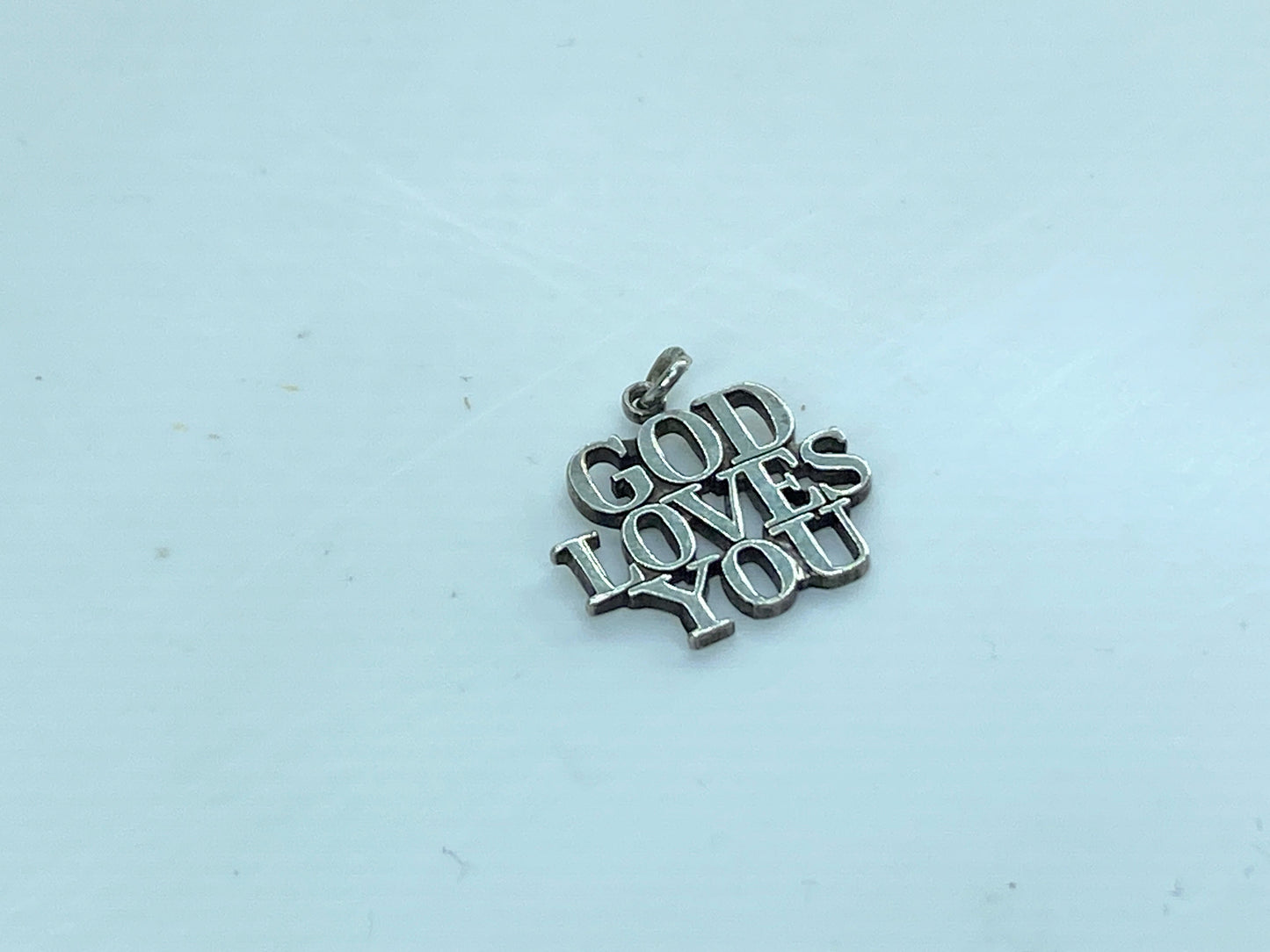 Rare retired Tiffany & Co. GOD LOVES YOU Sterling Silver charm/Pendant JR597