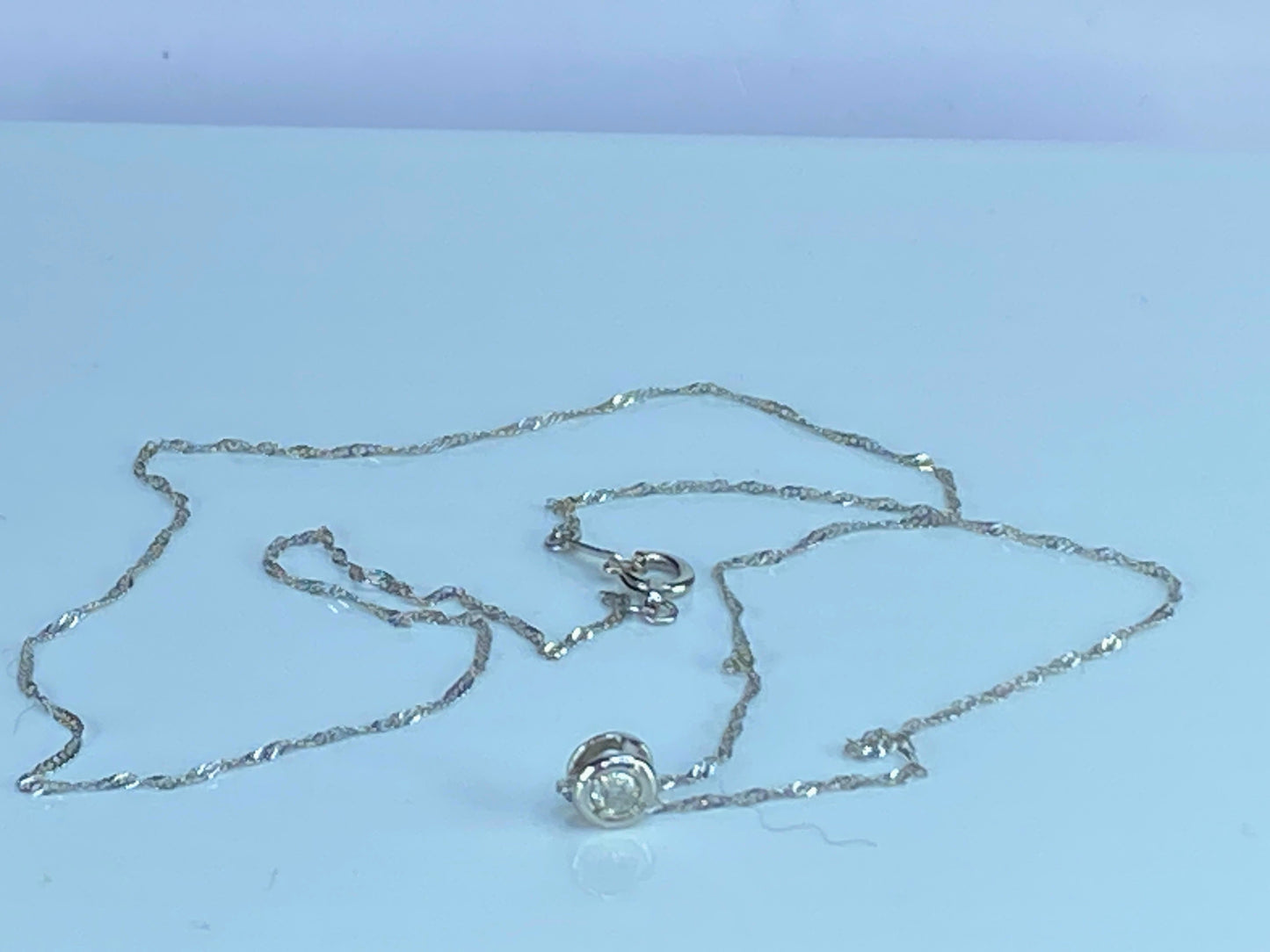 Platinum 0.1ct G/VS1 round brilliant diamond Sliding pendant necklace