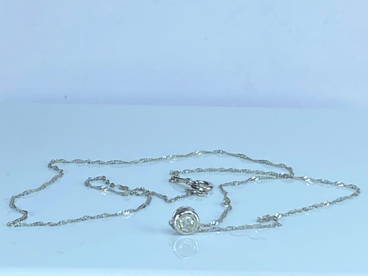 Platinum 0.1ct G/VS1 round brilliant diamond Sliding pendant necklace