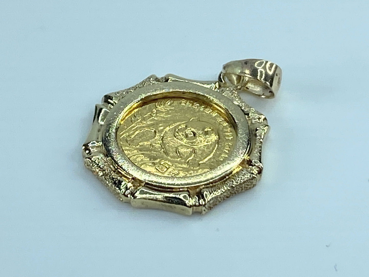 c1995 $5 1/20 oz 999.9 Panda Gold coin in 14K bamboo bezel
