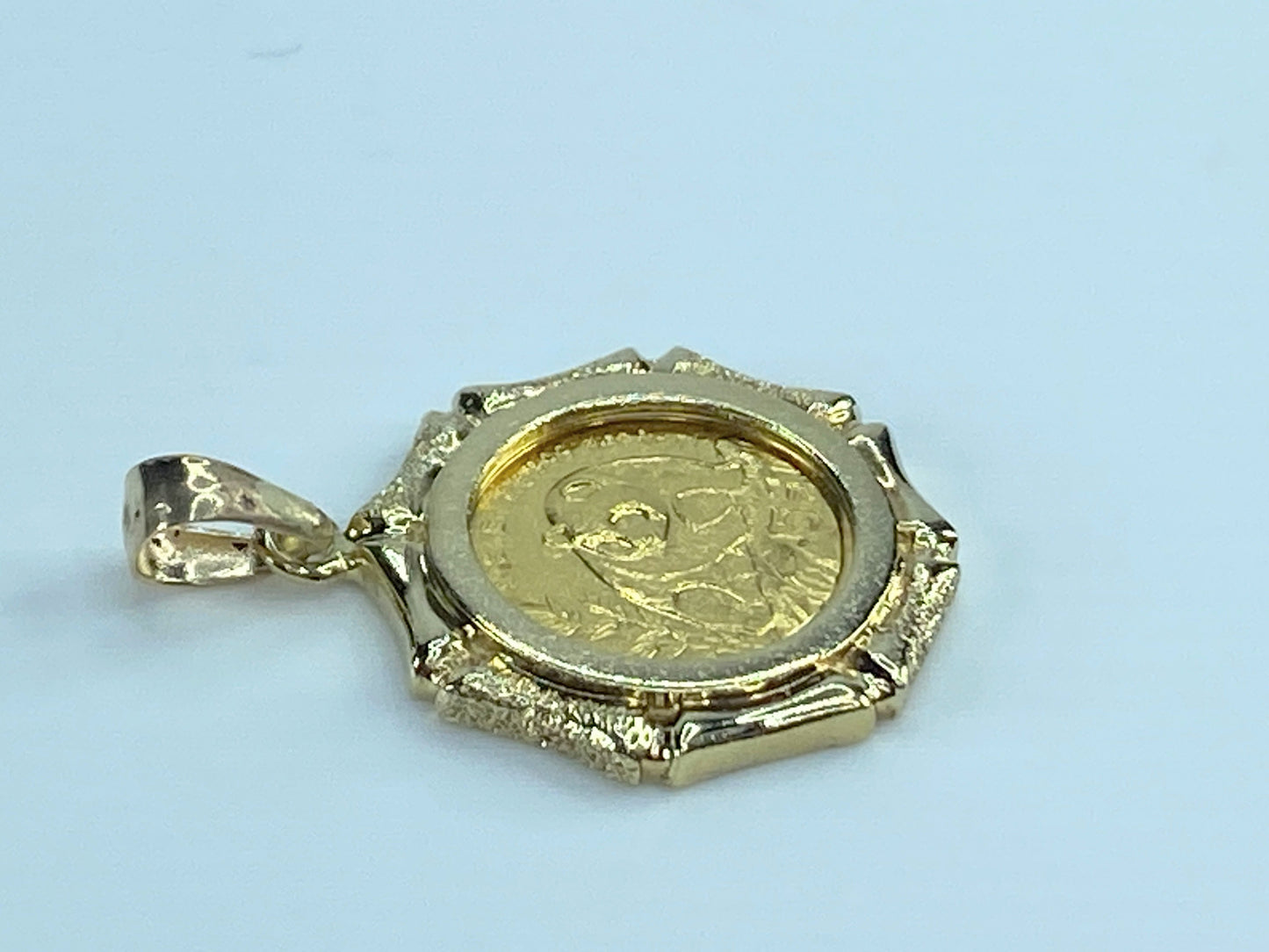 c1995 $5 1/20 oz 999.9 Panda Gold coin in 14K bamboo bezel