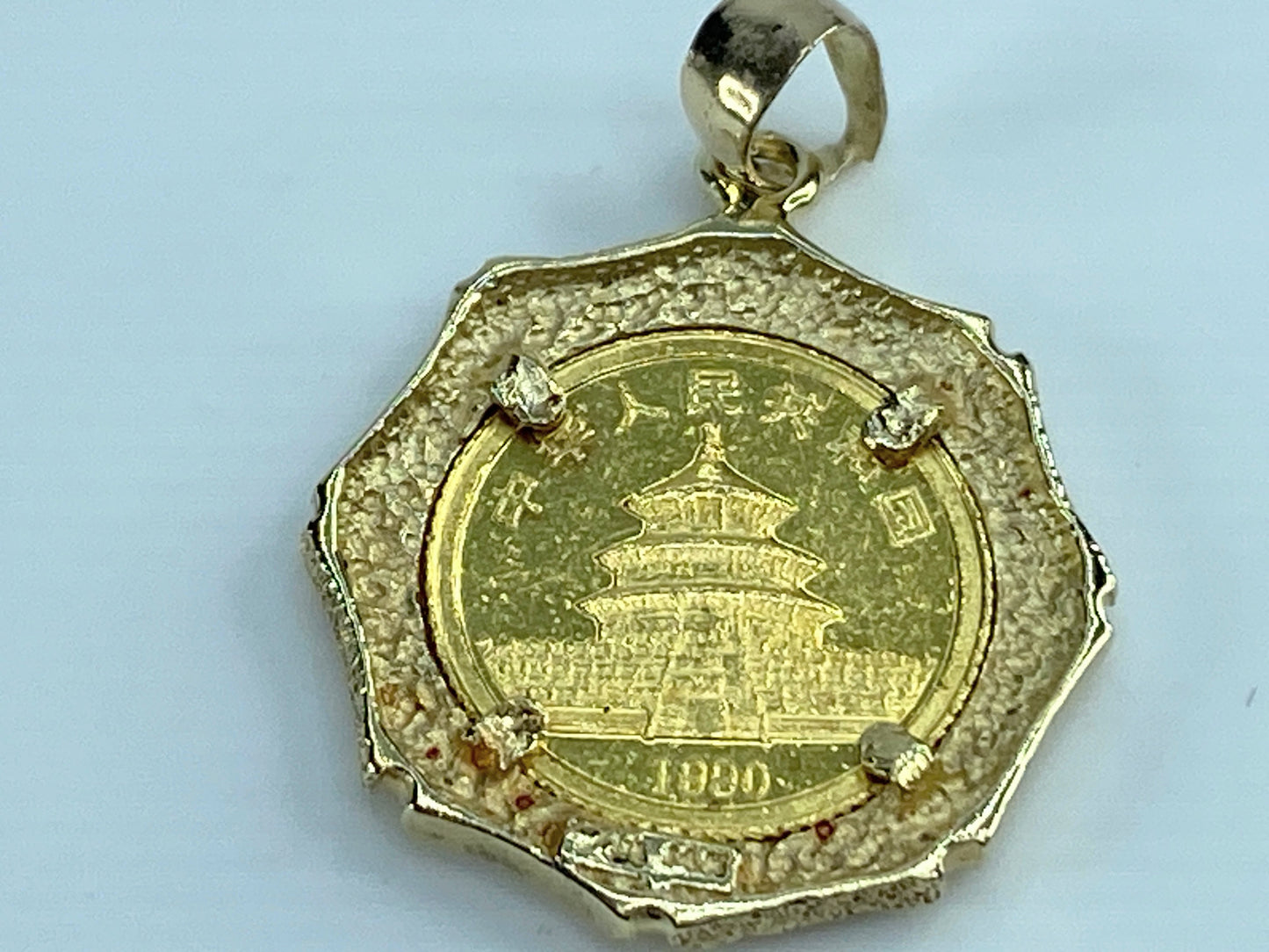 c1995 $5 1/20 oz 999.9 Panda Gold coin in 14K bamboo bezel