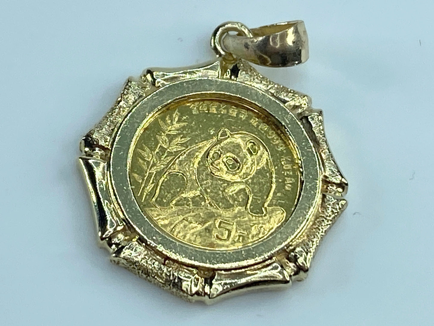 c1995 $5 1/20 oz 999.9 Panda Gold coin in 14K bamboo bezel