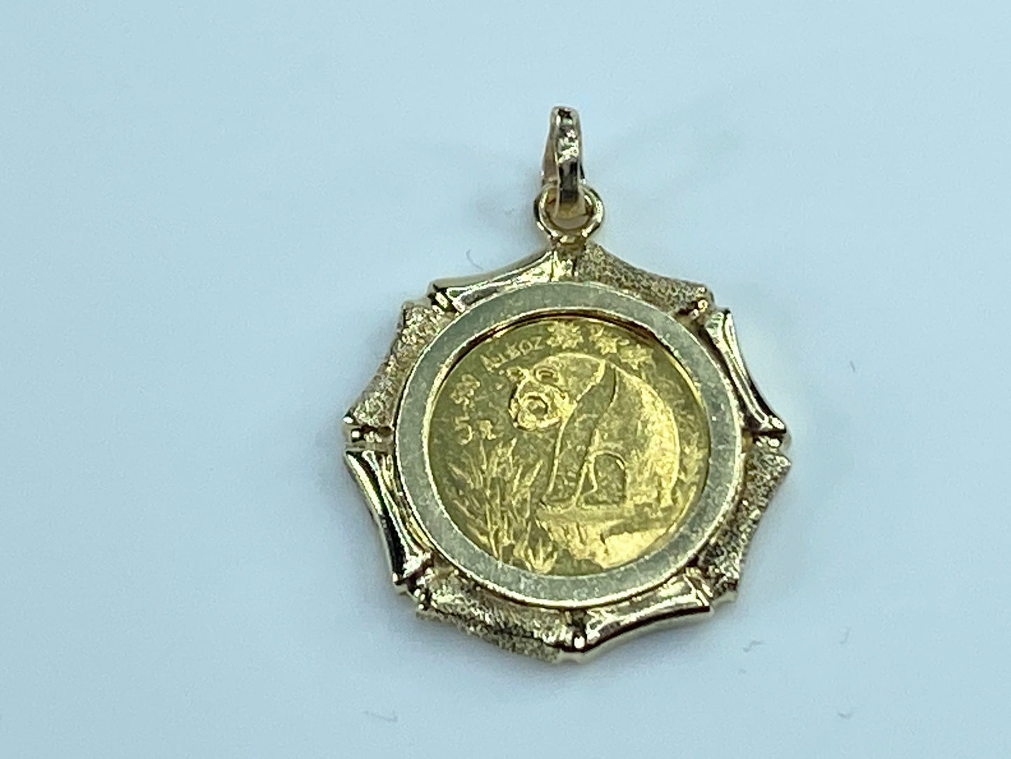c1995 $5 1/20 oz 999.9 Panda Gold coin in 14K bamboo bezel