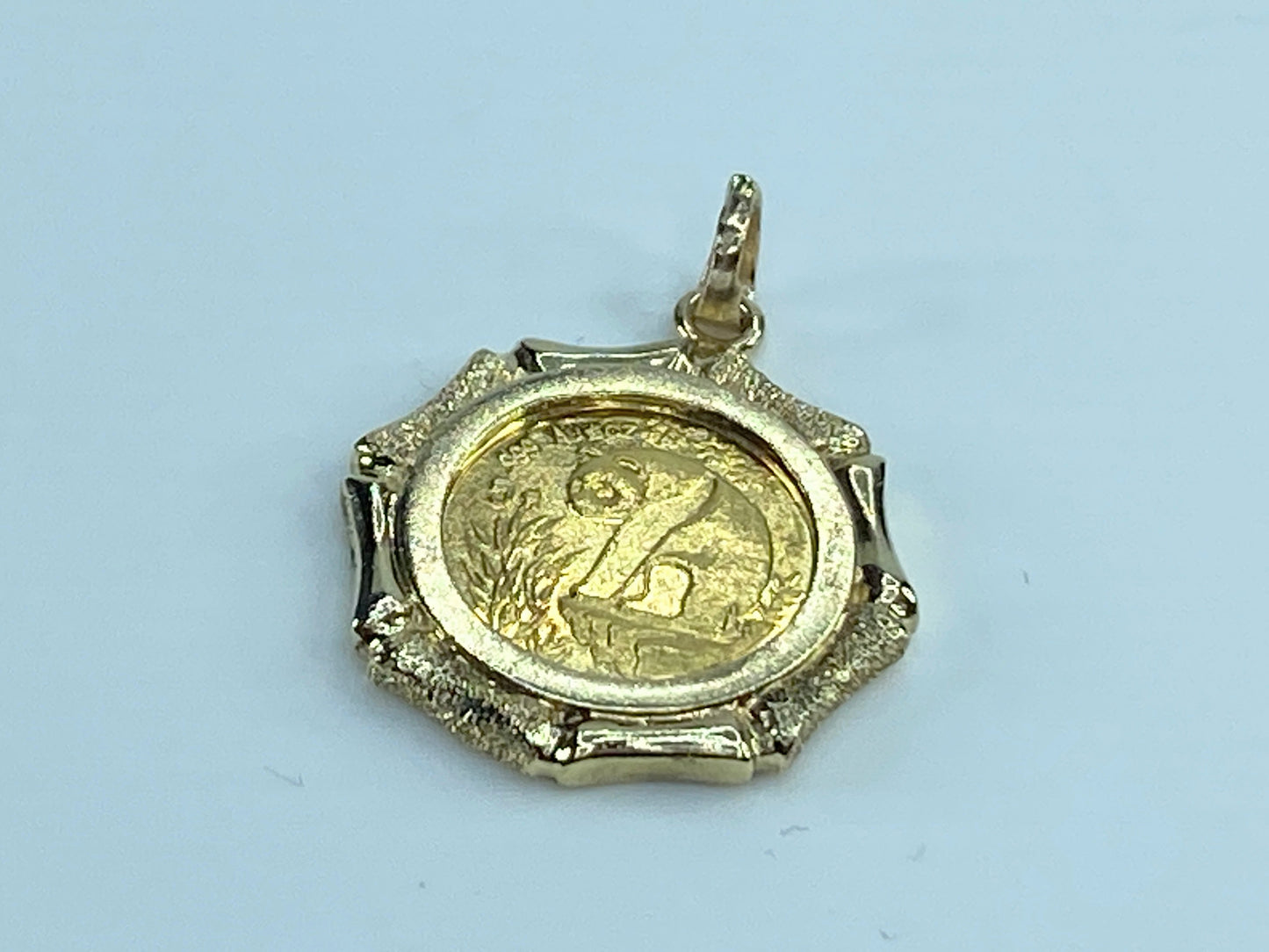 c1995 $5 1/20 oz 999.9 Panda Gold coin in 14K bamboo bezel
