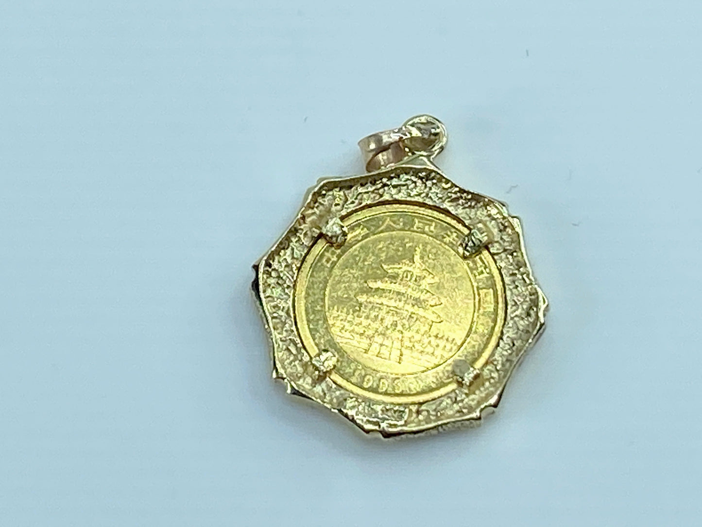 c1995 $5 1/20 oz 999.9 Panda Gold coin in 14K bamboo bezel