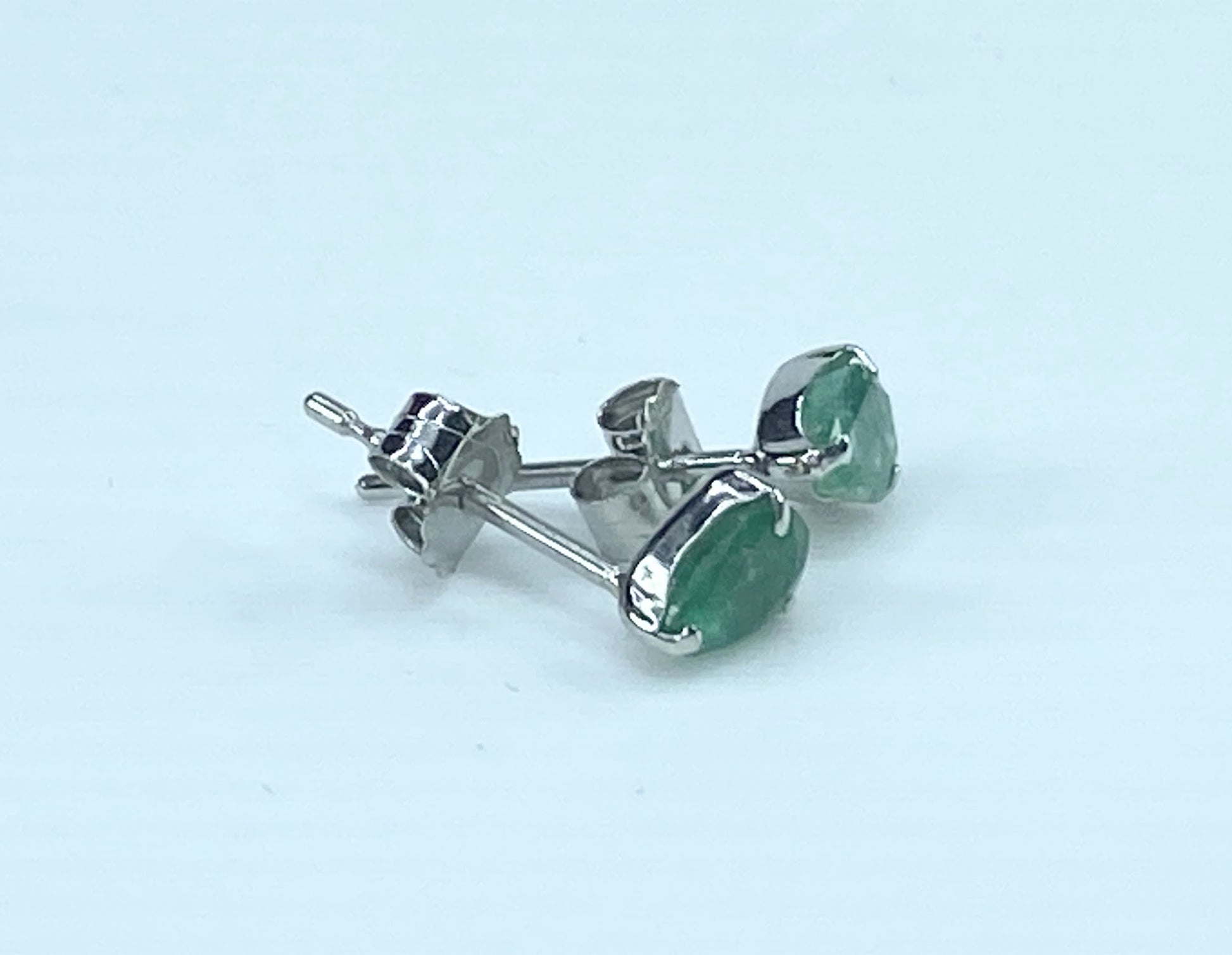 Platinum 0.8ctw Teardrop shape solitaire Emerald stud earrings