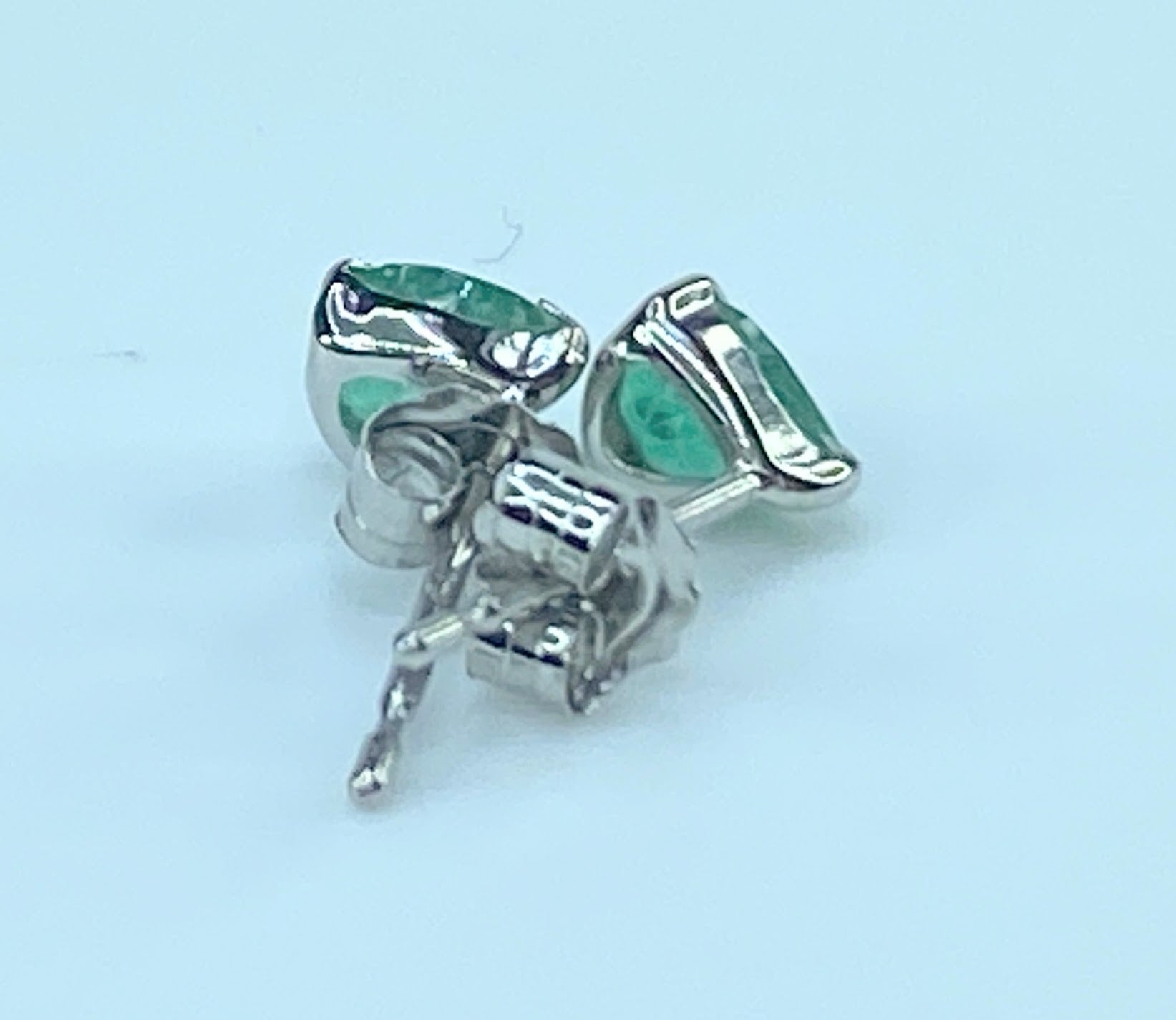 Platinum 0.8ctw Teardrop shape solitaire Emerald stud earrings