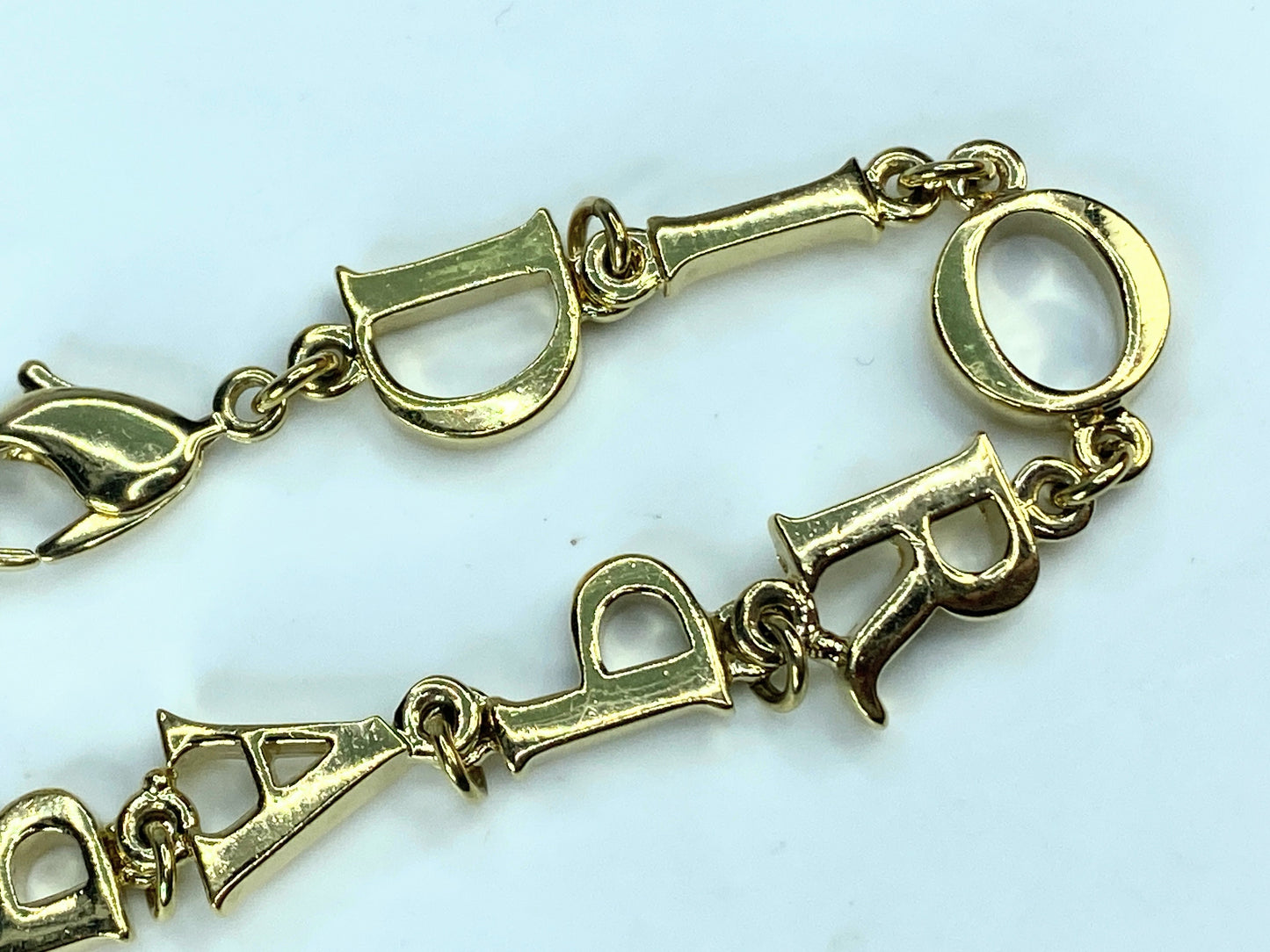 Christian Dior Bracelet Gold Auth Golden Letters bracelet 7 .75" 14.6g GS568