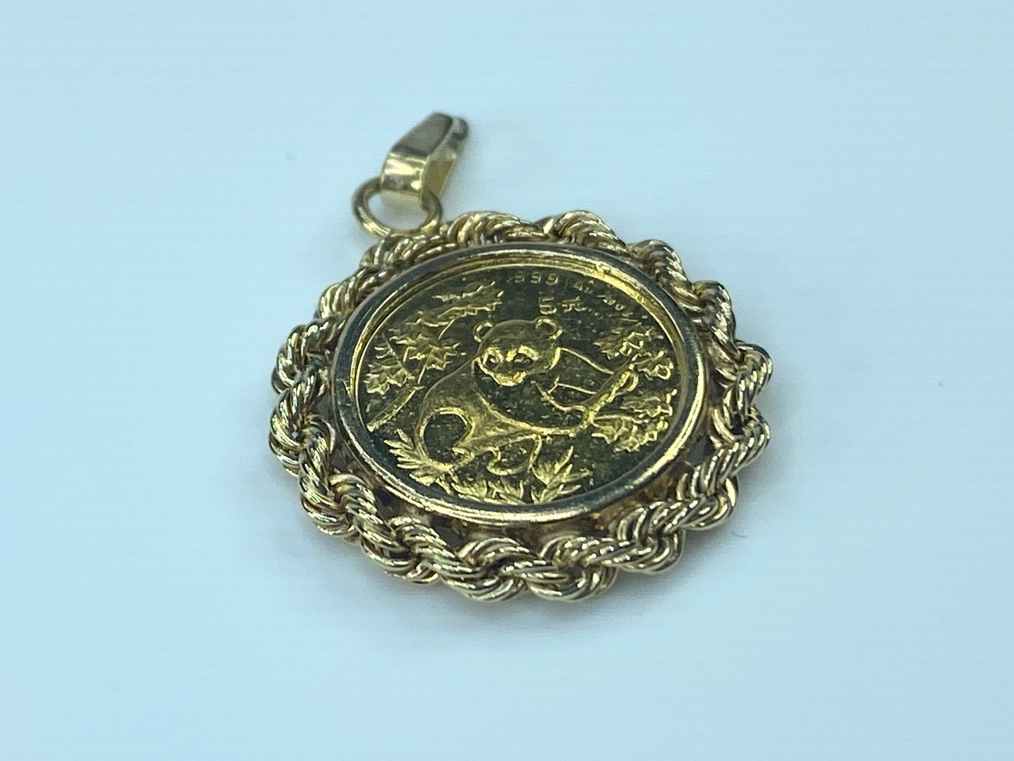 c1980 $5.0 1/20 oz 999.0 Panda coin in 14K Bamboo bezel
