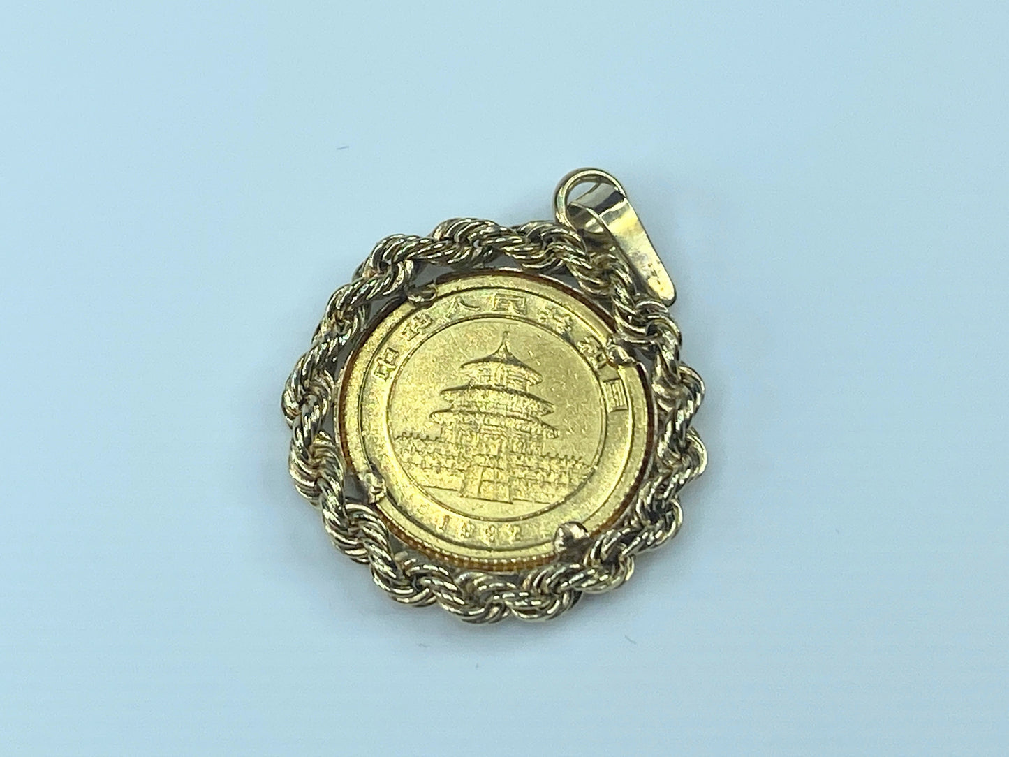 c1980 $5.0 1/20 oz 999.0 Panda coin in 14K Bamboo bezel