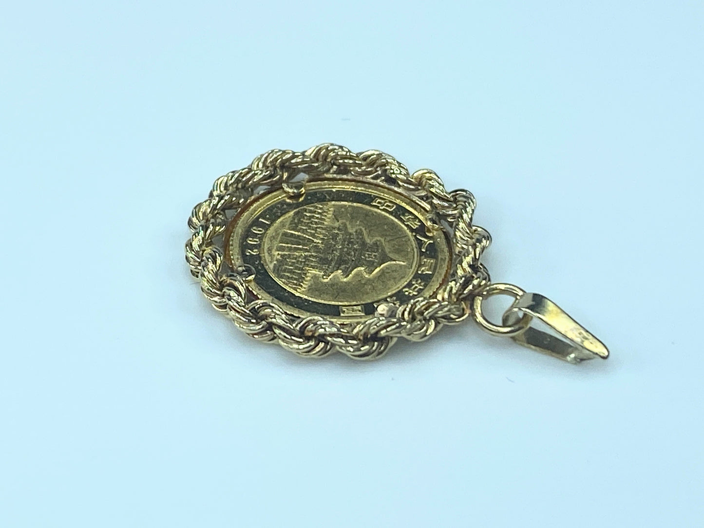 c1980 $5.0 1/20 oz 999.0 Panda coin in 14K Bamboo bezel