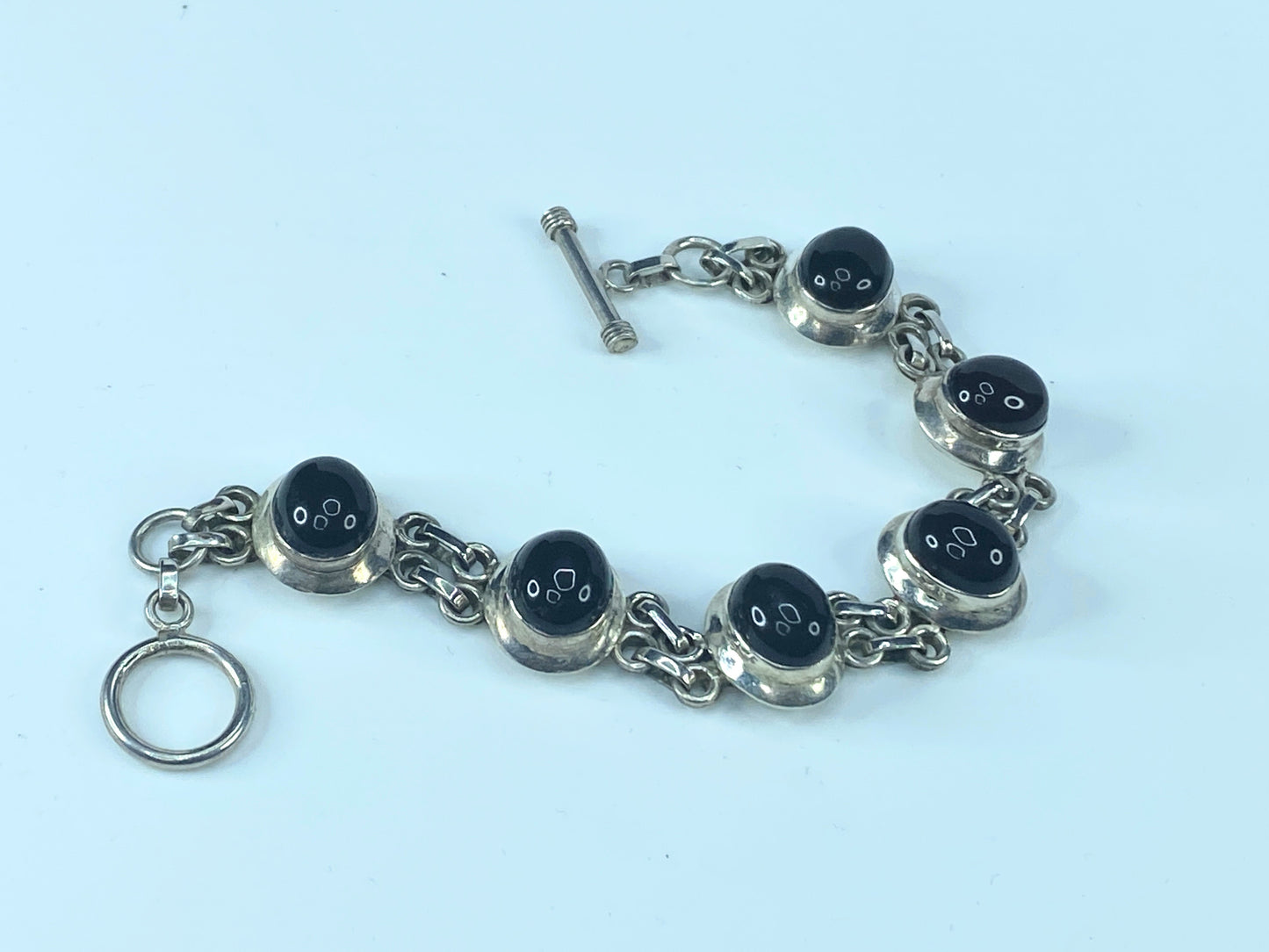 Sterling Silver Oval Dark Garnet Cabochon Toggle clasp bracelet