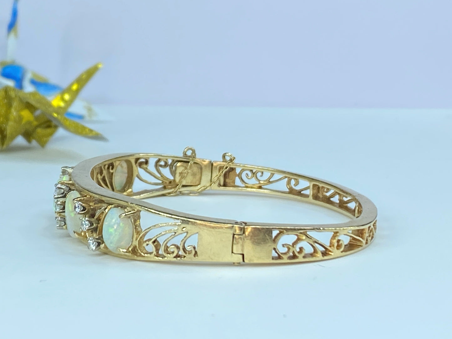 c1950 14K yellow gold 4.8ct Opal 0.4ct H/Si1 diamond hinged bangle 6.5"