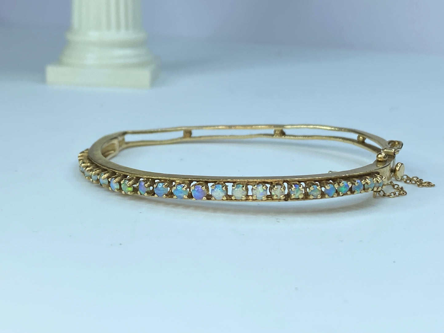 Mid-century 14K gold 2.75mm Opal Cabochons hinged bangle