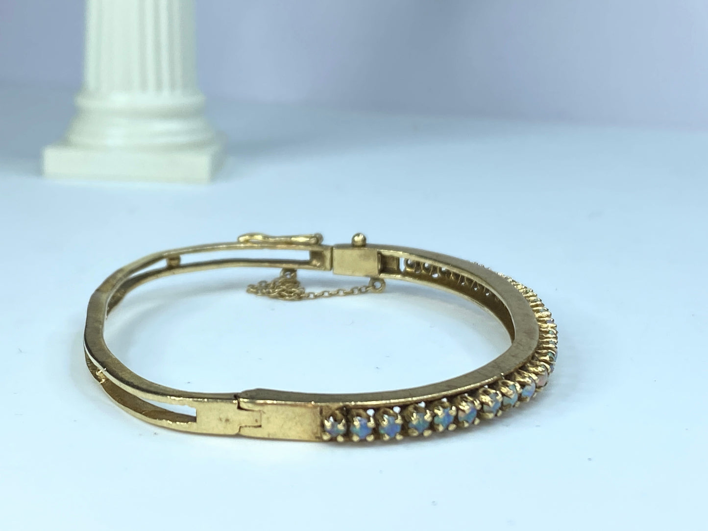 Mid-century 14K gold 2.75mm Opal Cabochons hinged bangle