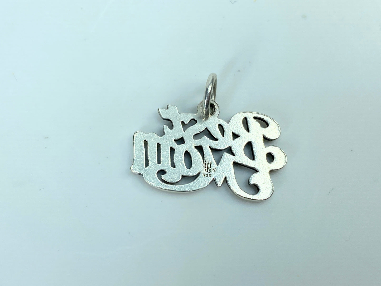 Show her who's best with a sterling silver charm that expresses your truest feelings, carefully crafted to remind her that she'll always be number one. Sterling silver approx. 22.0 x 13.8mm, weight 2.3 grams