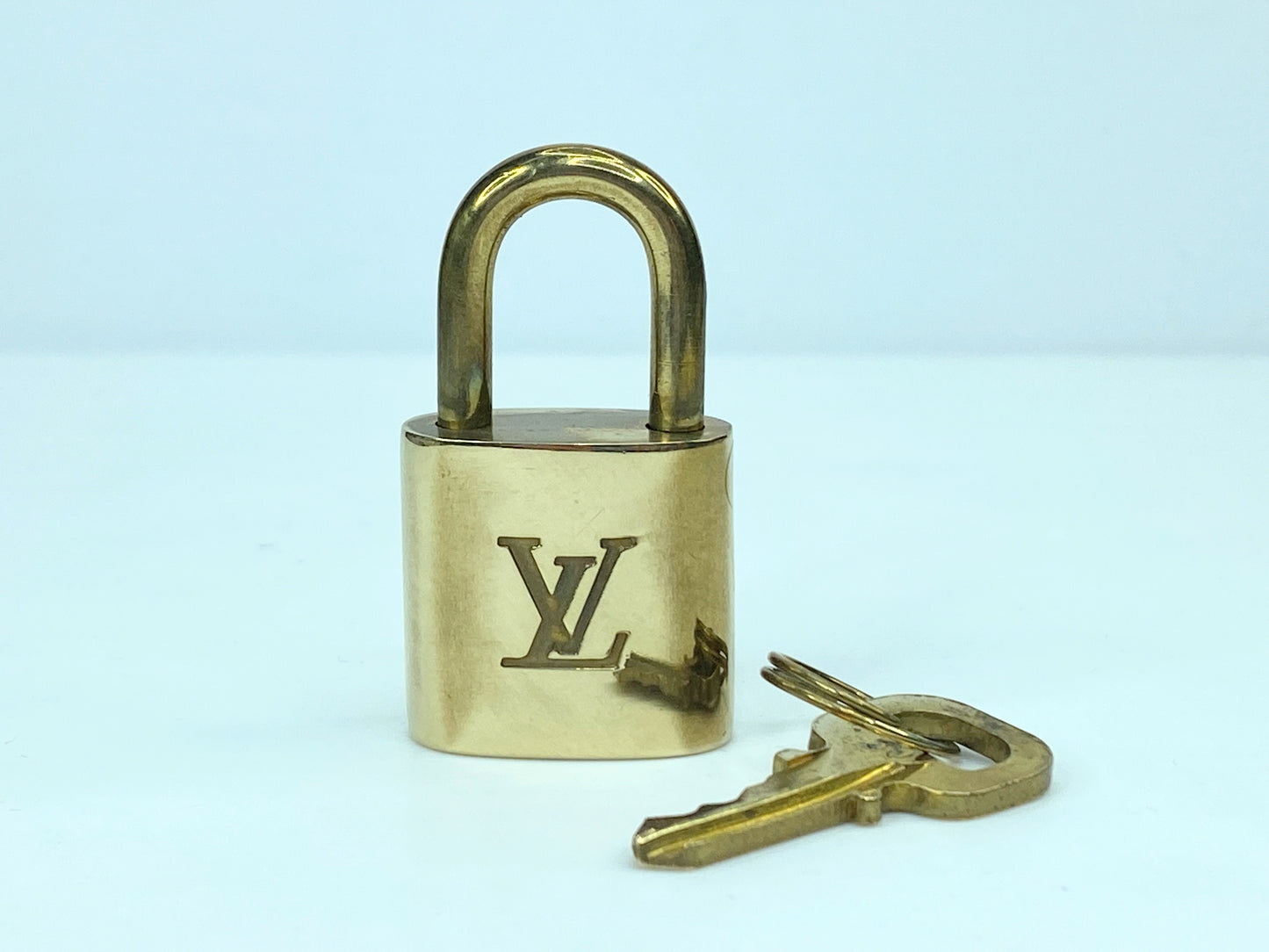 Vintage Louis Vuitton Brass Lock and matching Key Set, lot number random GS633