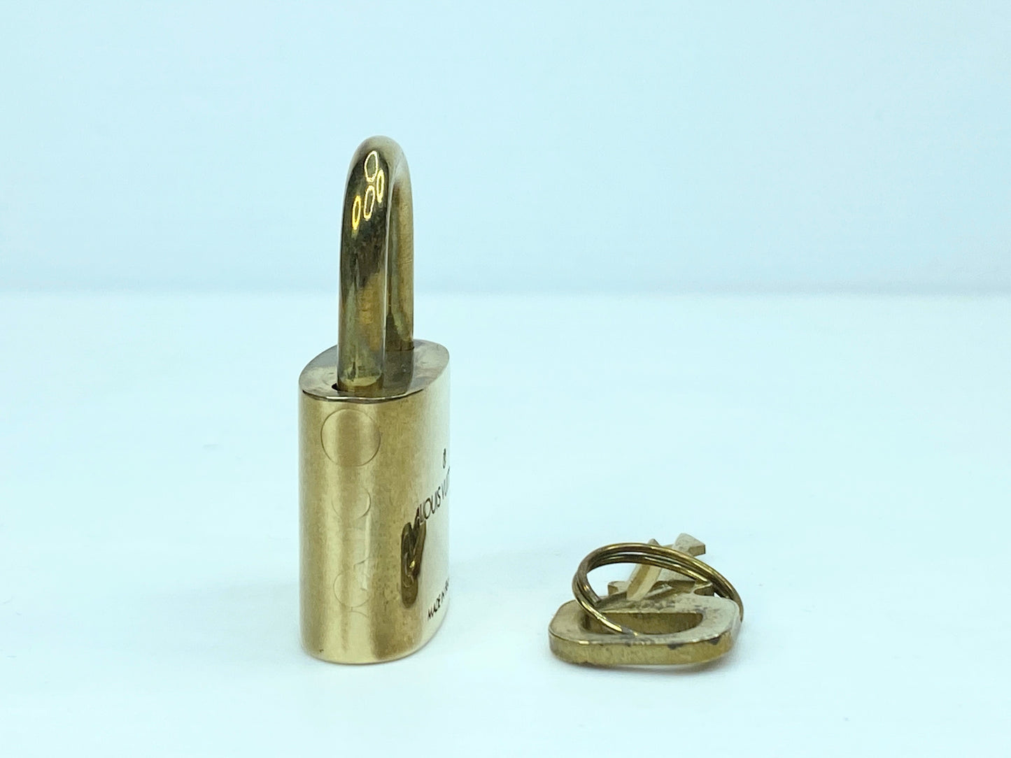 Vintage Louis Vuitton Brass Lock and matching Key Set, lot number random GS633