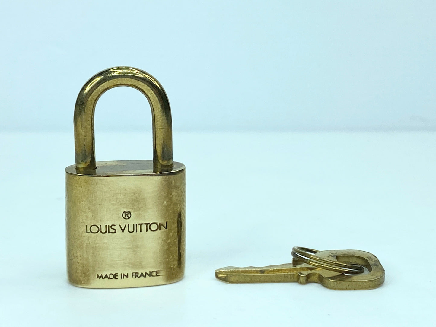 Vintage Louis Vuitton Brass Lock and matching Key Set, lot number random GS633