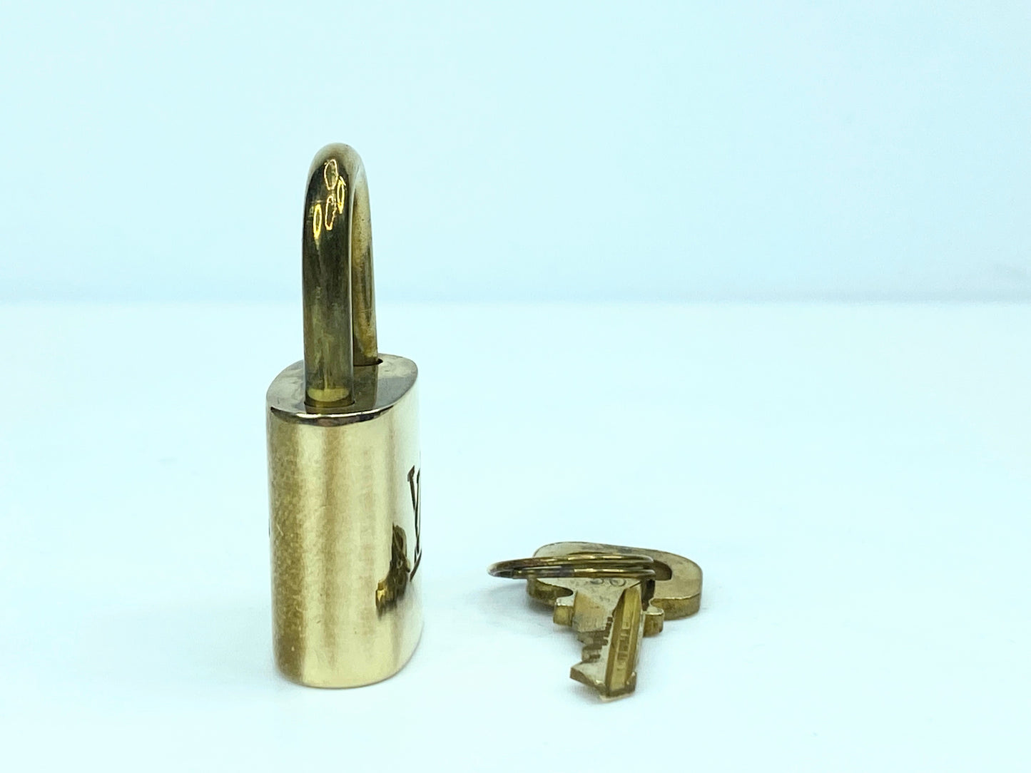 Vintage Louis Vuitton Brass Lock and matching Key Set, lot number random GS633