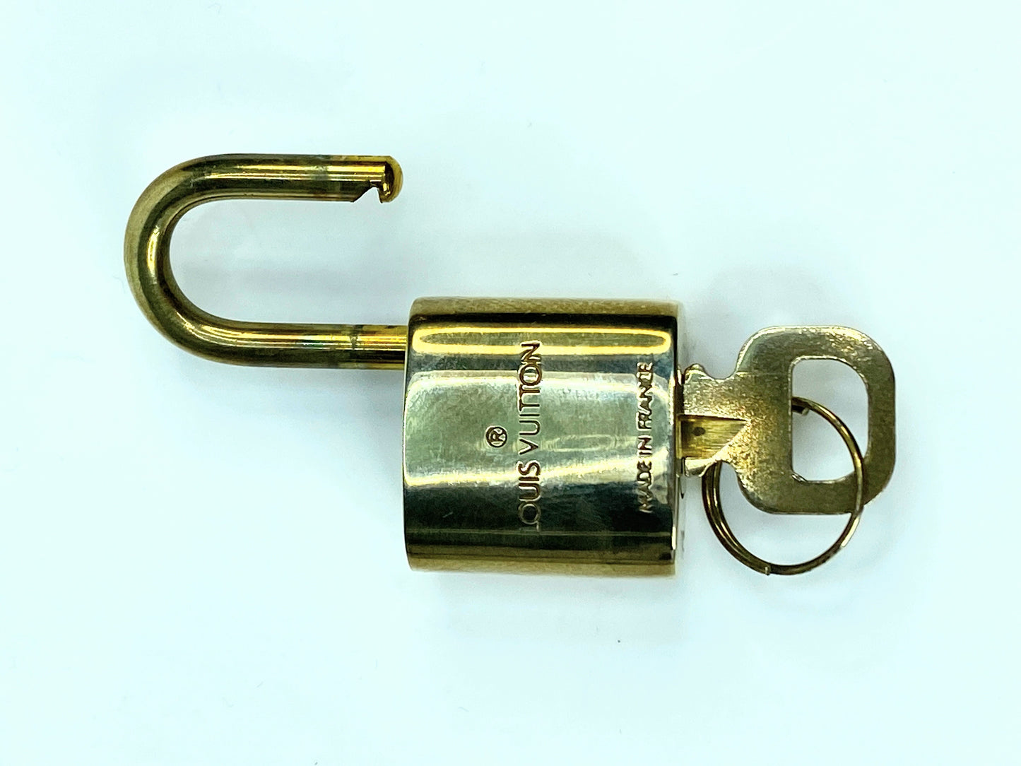 Vintage Louis Vuitton Brass Lock and matching Key Set, lot number random GS633
