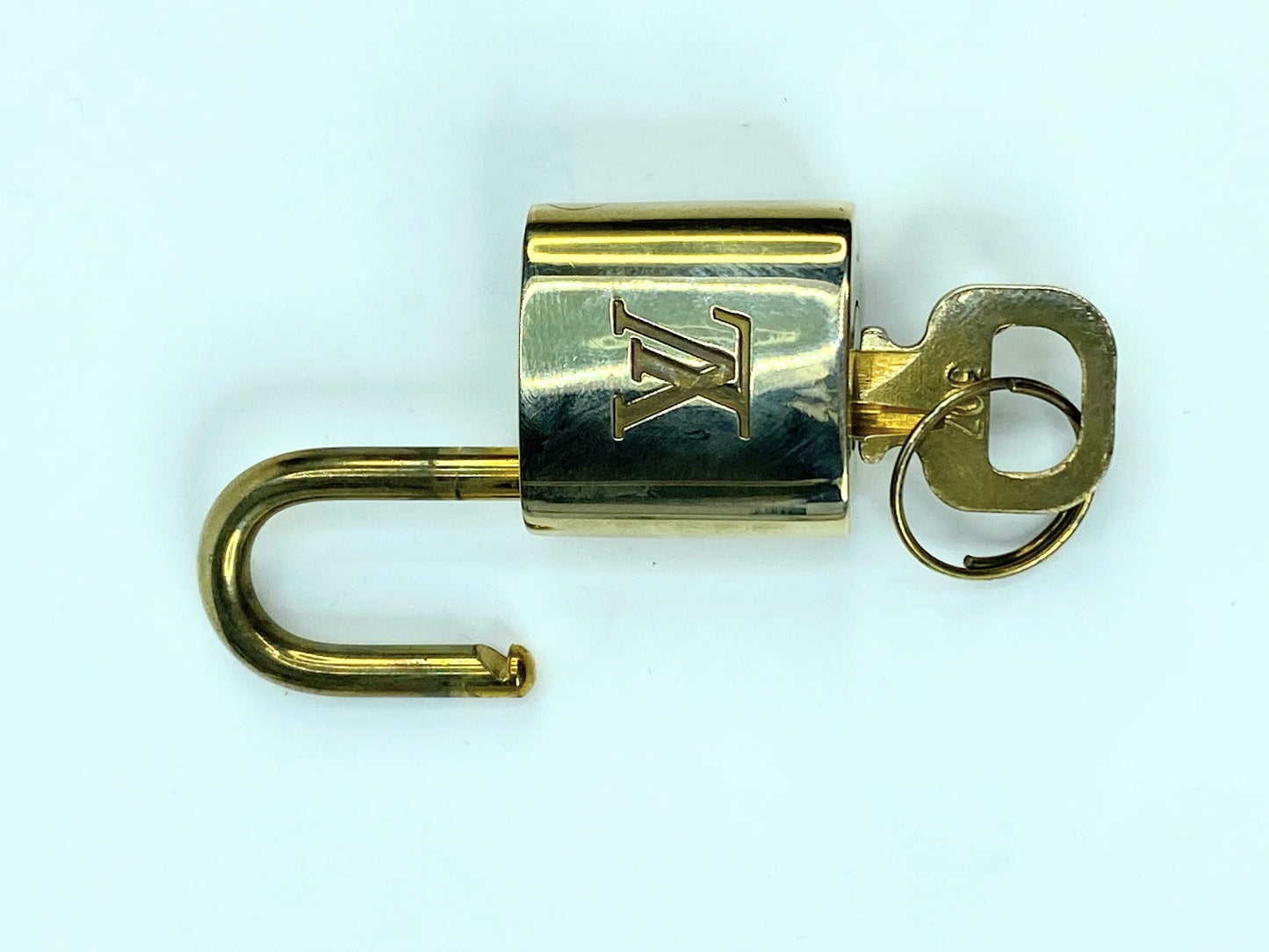 Vintage Louis Vuitton Brass Lock and matching Key Set, lot number random GS633