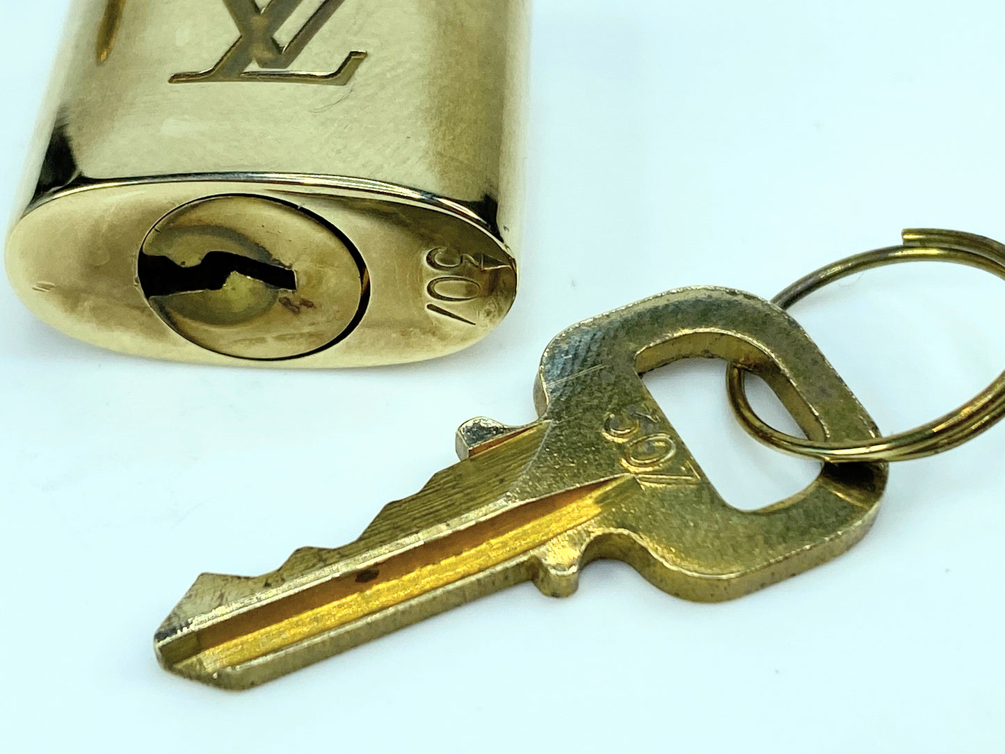 Vintage Louis Vuitton Brass Lock and matching Key Set, lot number random GS633
