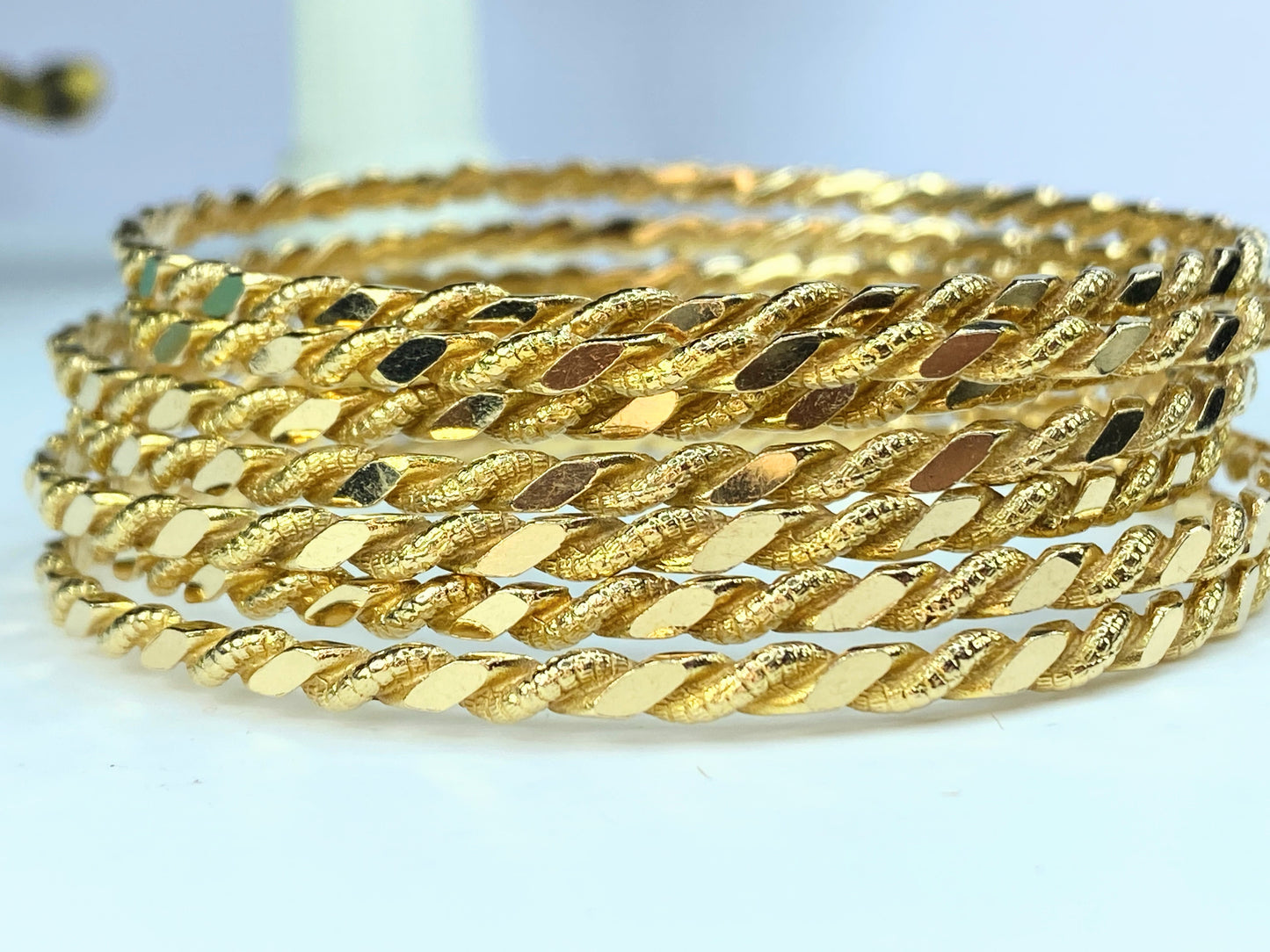 Twisted multiple grains Weekly bangles in 14K yellow gold set of 7