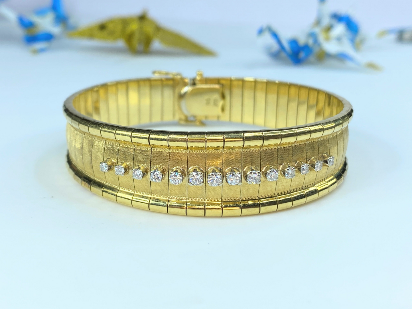 18K gold 0.55ct G/VS1 Round brilliant Diamond Omega bracelet