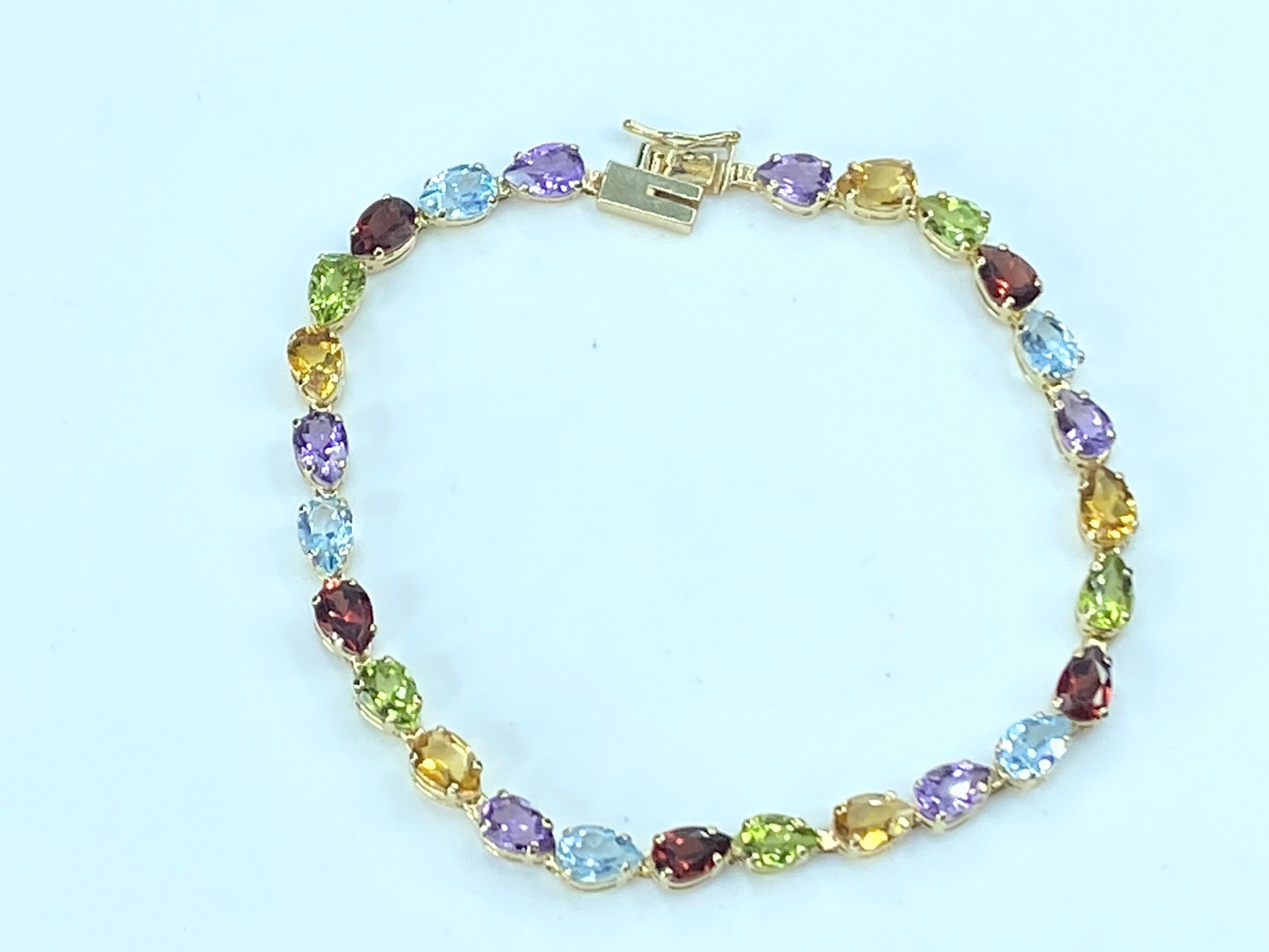 10.74ct Marquise cut Rainbow gemstone Tennis bracelet in 14K