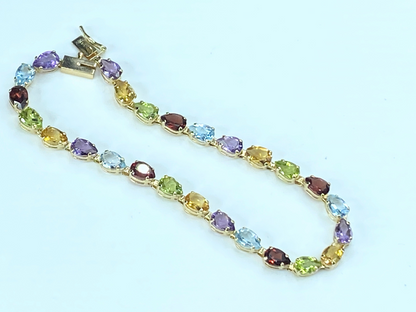 10.74ct Marquise cut Rainbow gemstone Tennis bracelet in 14K