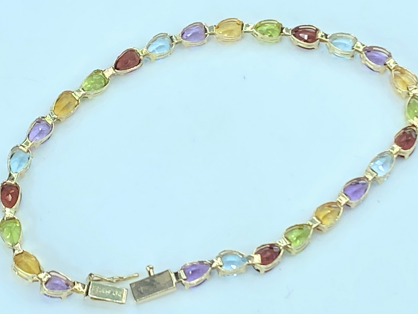 10.74ct Marquise cut Rainbow gemstone Tennis bracelet in 14K