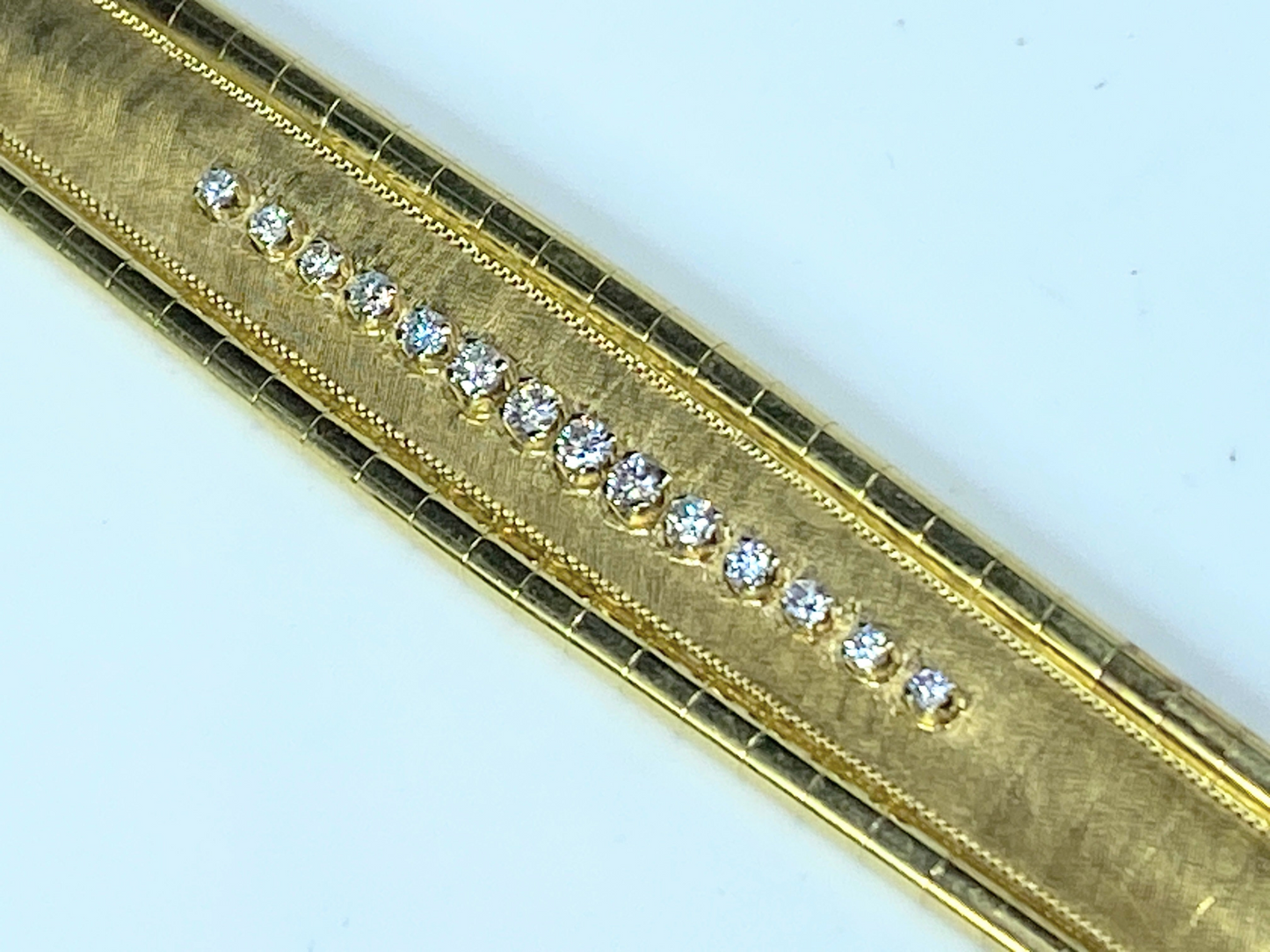 18K gold 0.55ct G/VS1 Round brilliant Diamond Omega bracelet