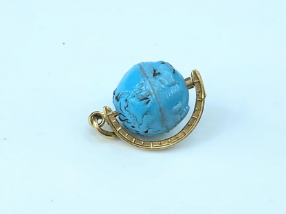 14K yellow gold Blue Global spinning charm