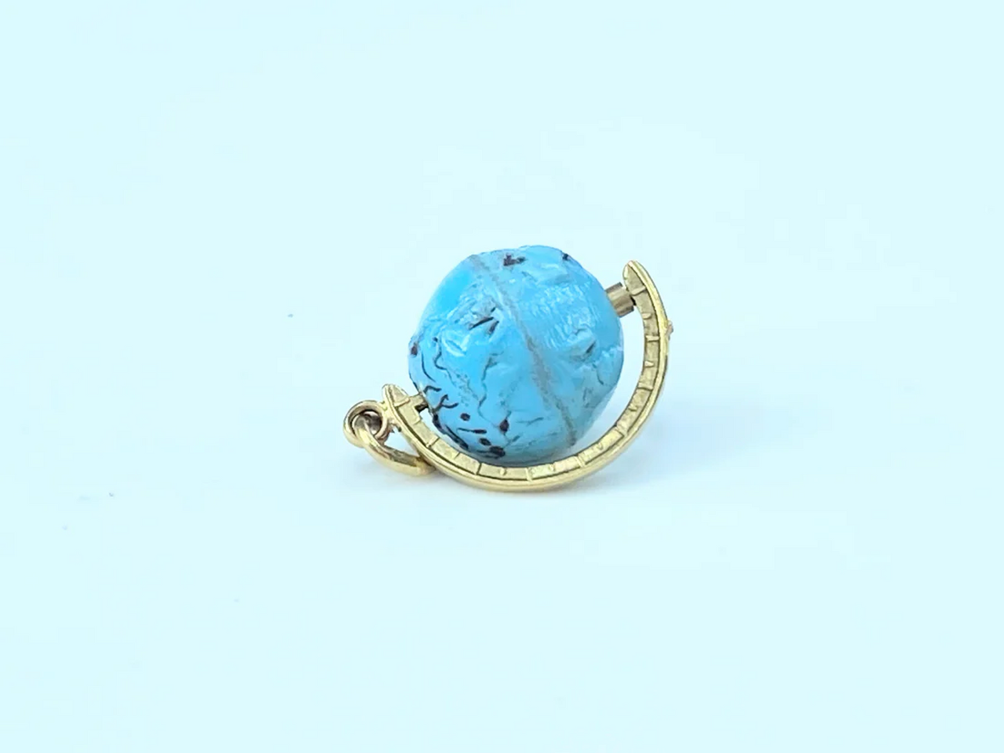 14K yellow gold Blue Global spinning charm