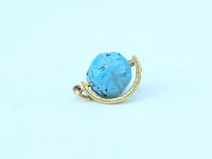 14K yellow gold Blue Global spinning charm