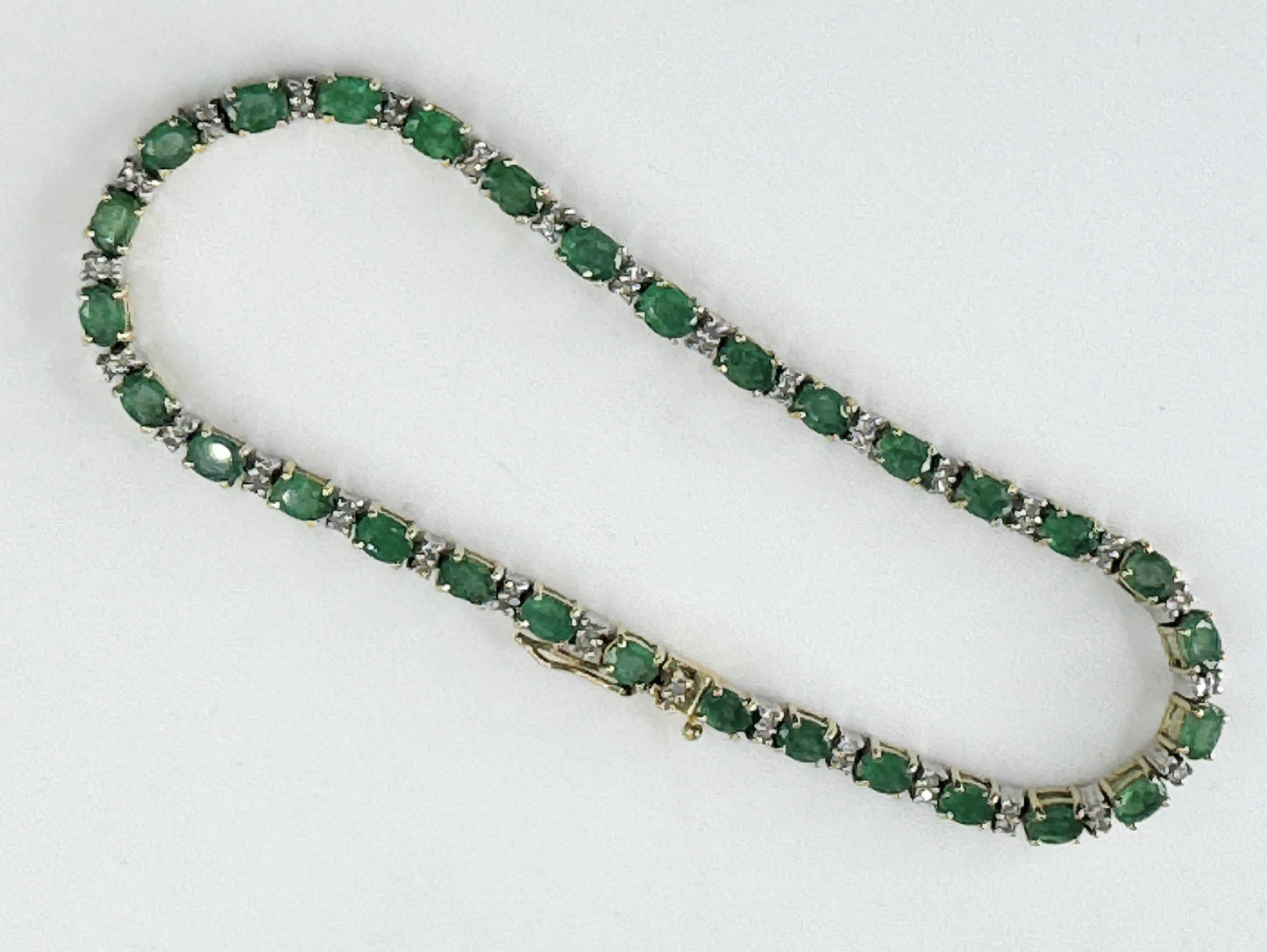 Natural emerald and diamond 14k gold 7.5” line bracelet JR9384