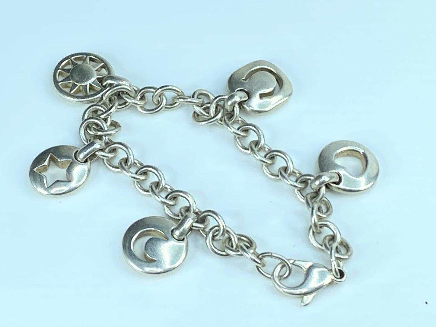 Tiffany & Co Silver Heart Sun Star Moon Horseshoe Stencil Charm bracelet