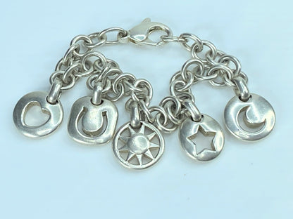 Tiffany & Co Silver Heart Sun Star Moon Horseshoe Stencil Charm bracelet