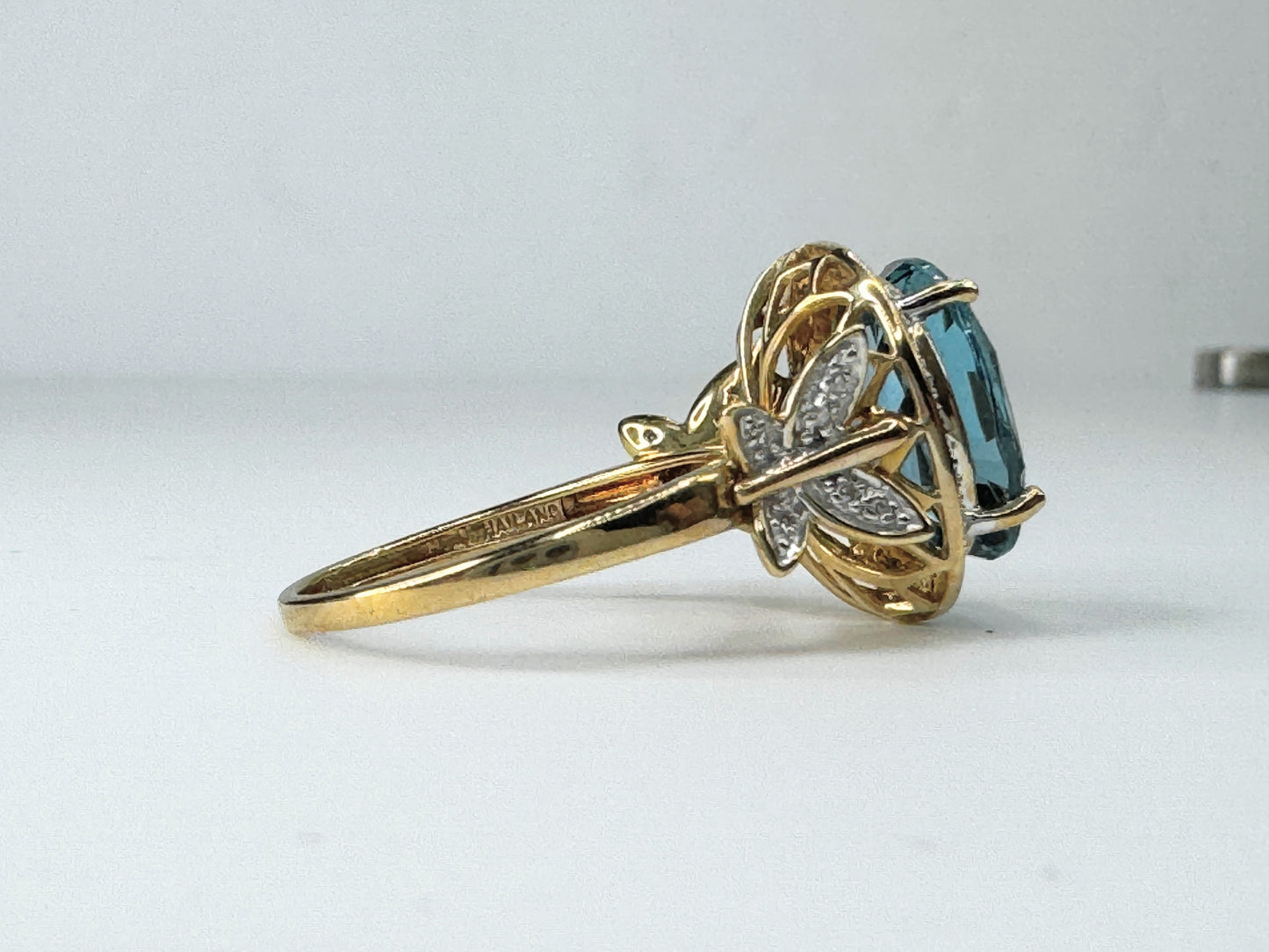 Sleek Gold Blue Topaz and Diamond Ring JR9473