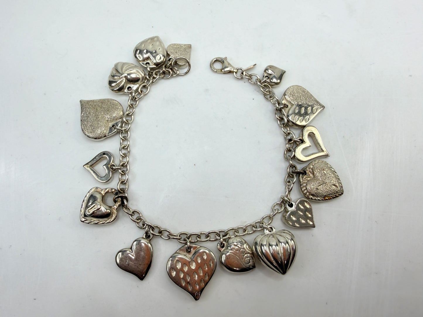 Vintage Sterling Silver Multi Charm Bracelet 14 Charms 19.5g 8.25in JR1494