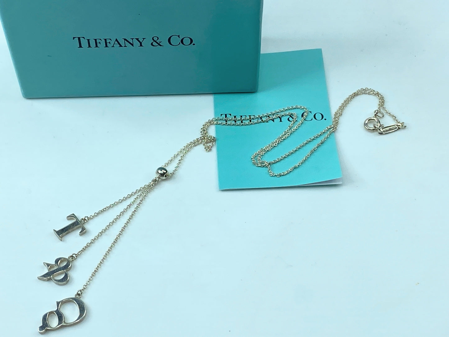 Tiffany & Co. Sterling Silver Logo Drop Pendant Necklace JR342